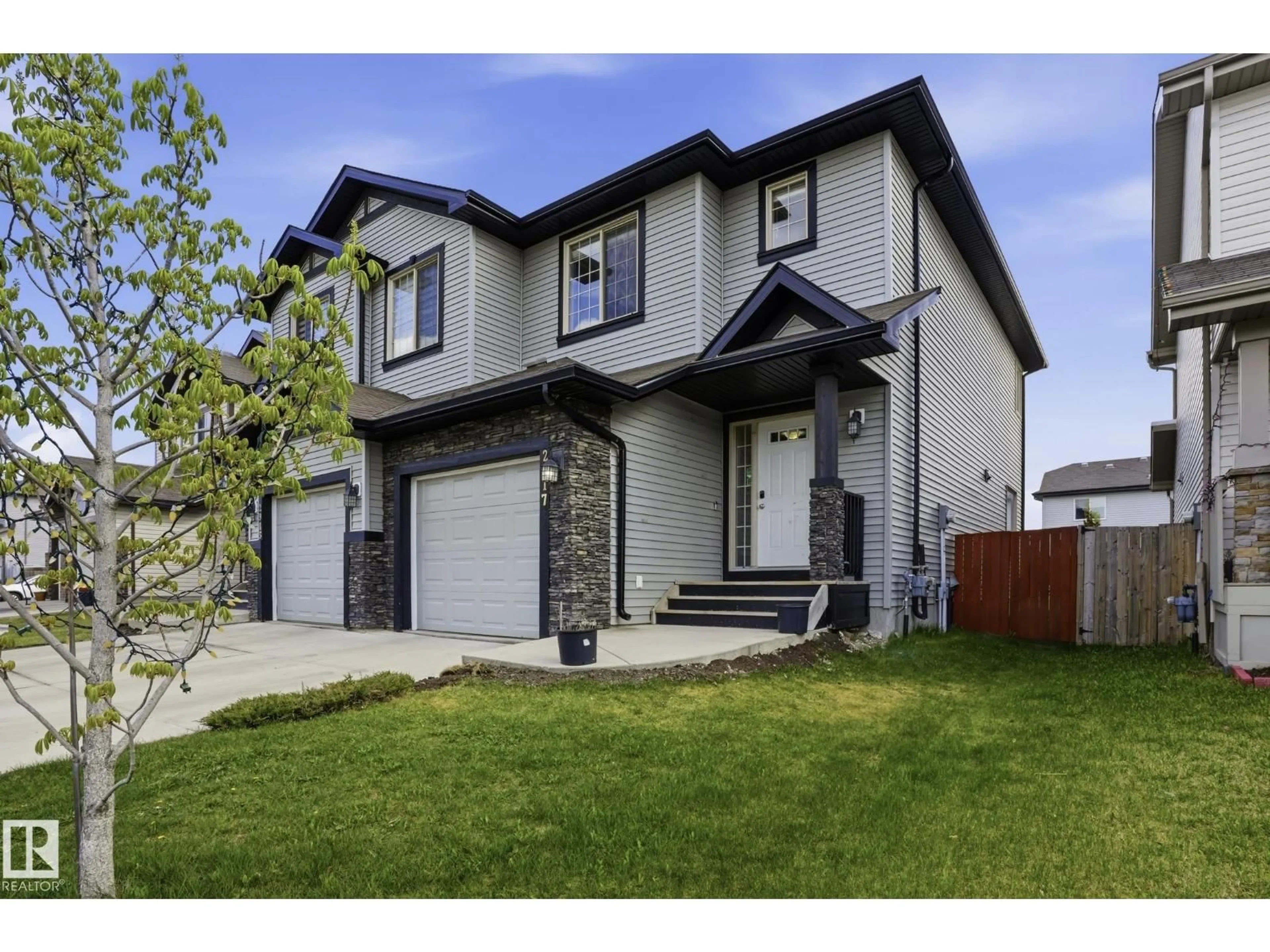 Home with vinyl exterior material, street for 2917 16A AV, Edmonton Alberta T6T0P8