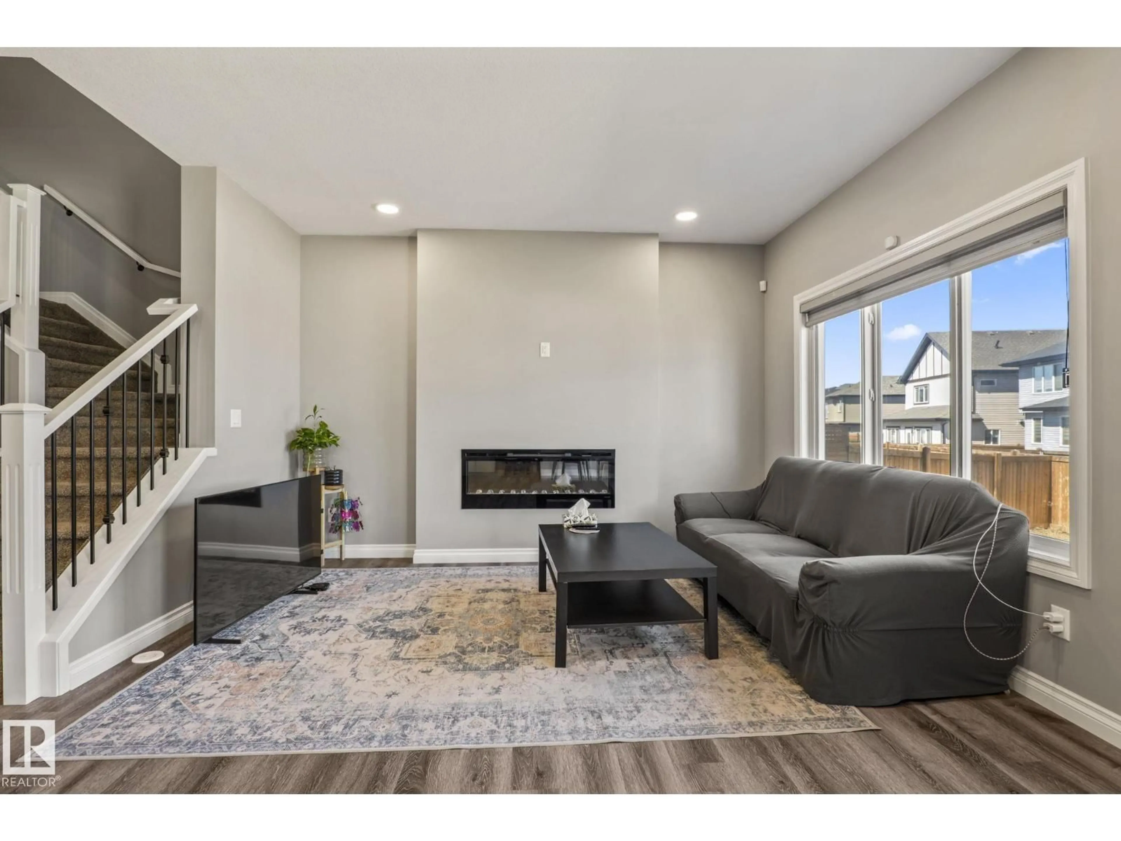 Living room with furniture, unknown for SW - 5142 23A AV, Edmonton Alberta T6X3A5