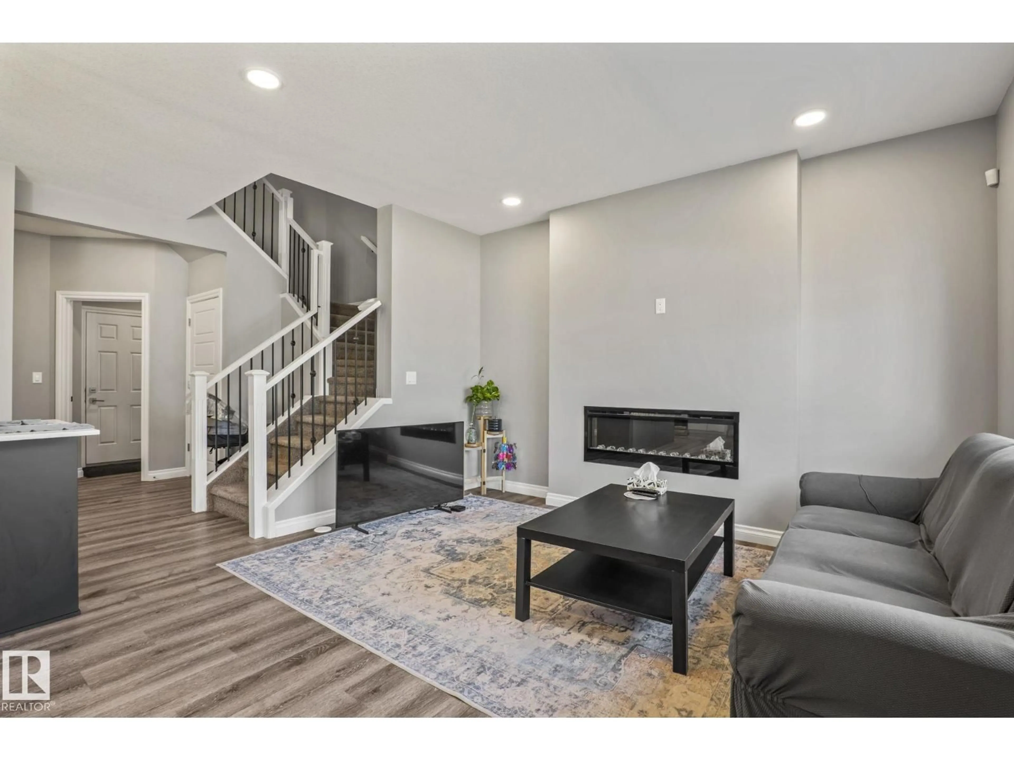 Living room with furniture, unknown for SW - 5142 23A AV, Edmonton Alberta T6X3A5