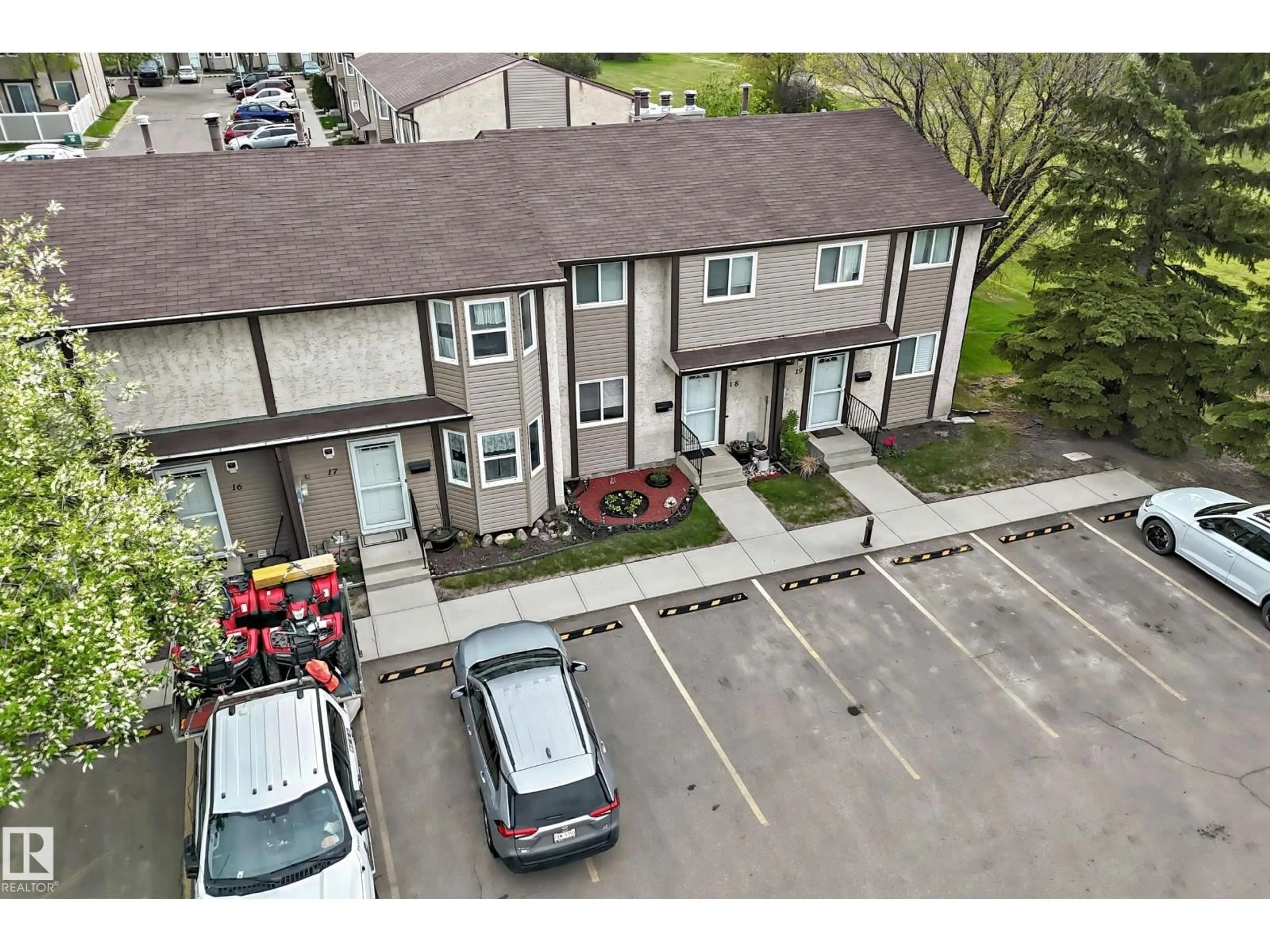 A pic from outside/outdoor area/front of a property/back of a property/a pic from drone, street for #18 - 10453 20 AV, Edmonton Alberta T6J5A1