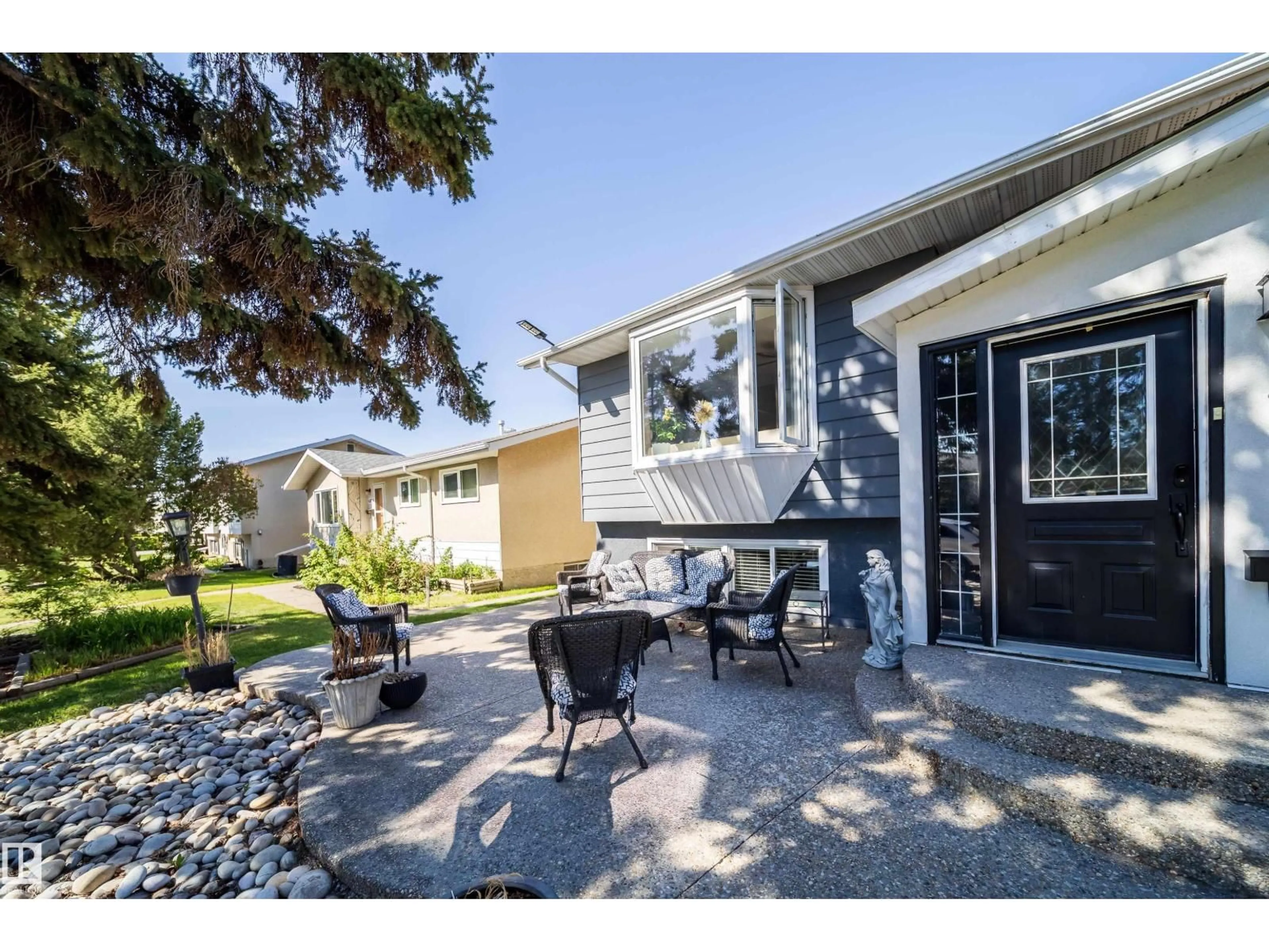 Home with vinyl exterior material, street for NW - 14808 96 ST, Edmonton Alberta T5E4W7