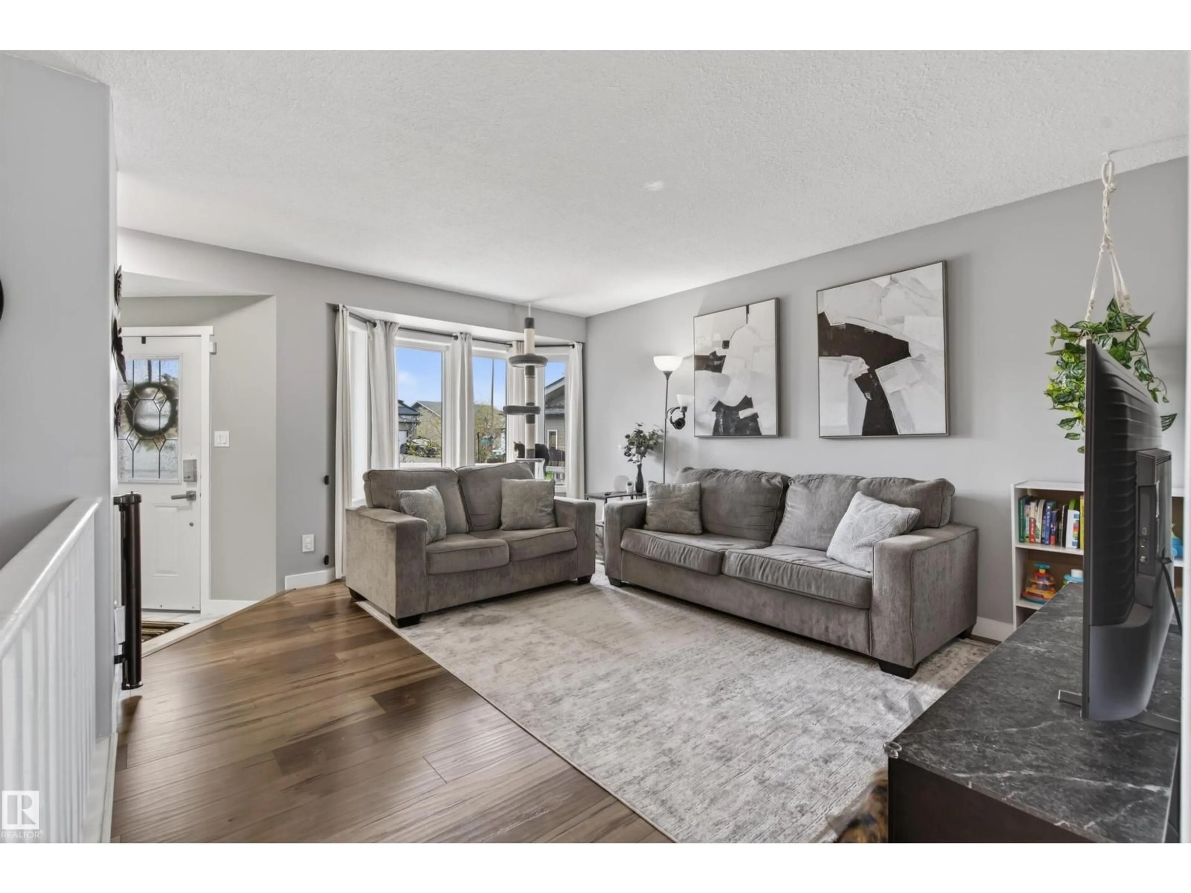 Living room with furniture, unknown for 1506 15 ST, Cold Lake Alberta T9M1Z8