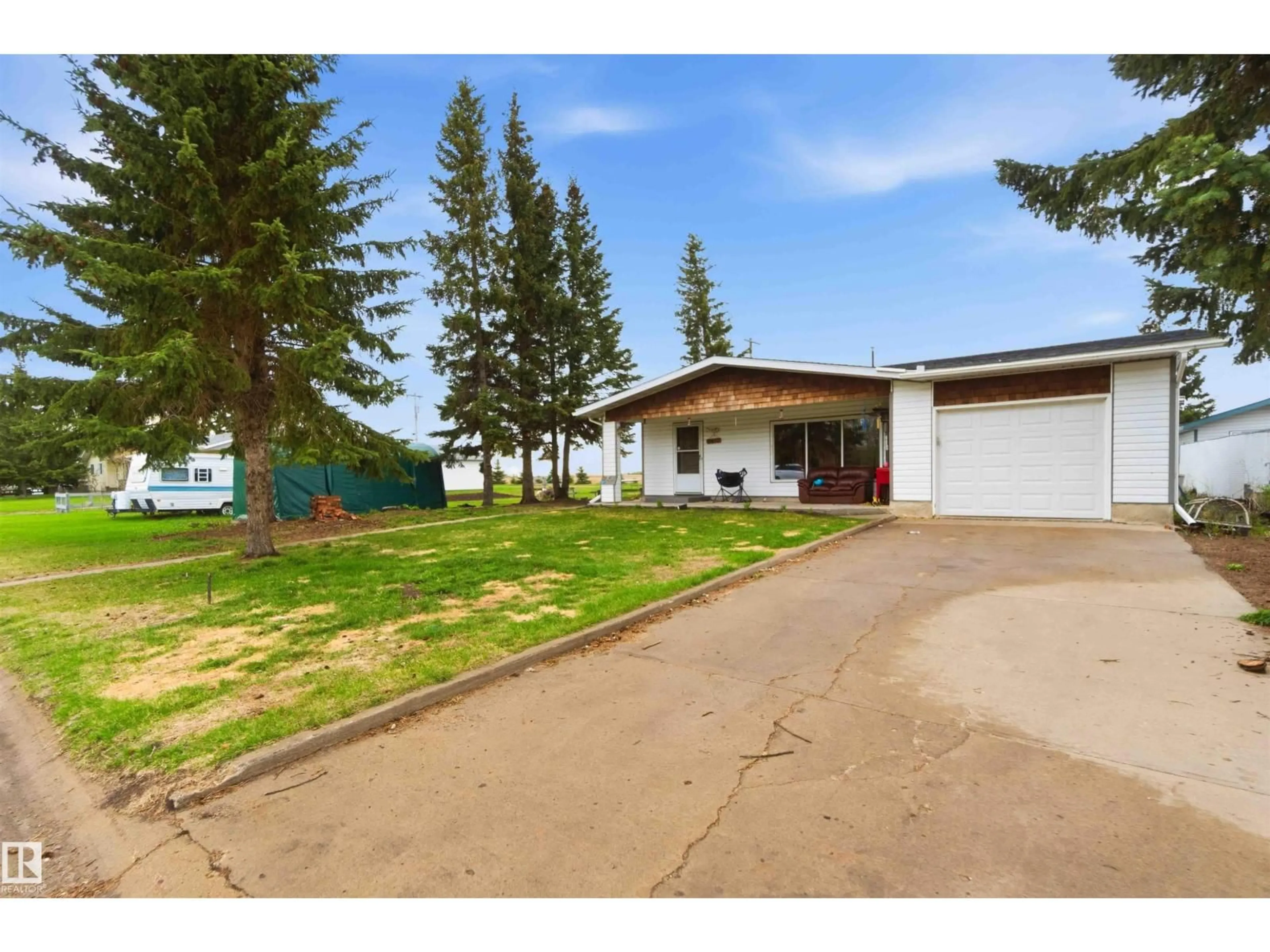 A pic from outside/outdoor area/front of a property/back of a property/a pic from drone, unknown for 5437 49 AV, Andrew Alberta T0B0C0