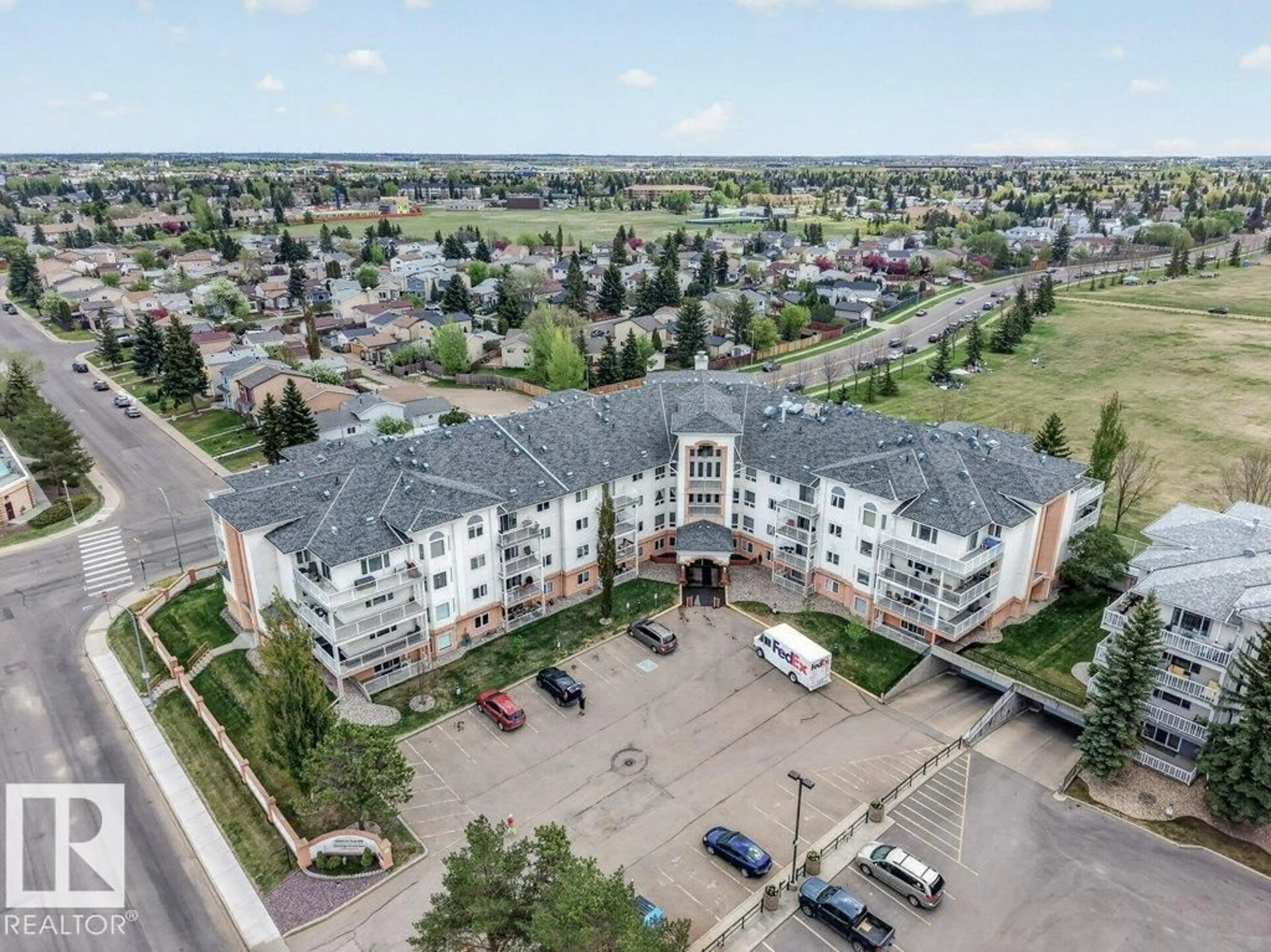 A pic from outside/outdoor area/front of a property/back of a property/a pic from drone, unknown for 101 10903 21 AV, Edmonton Alberta T6J7A4