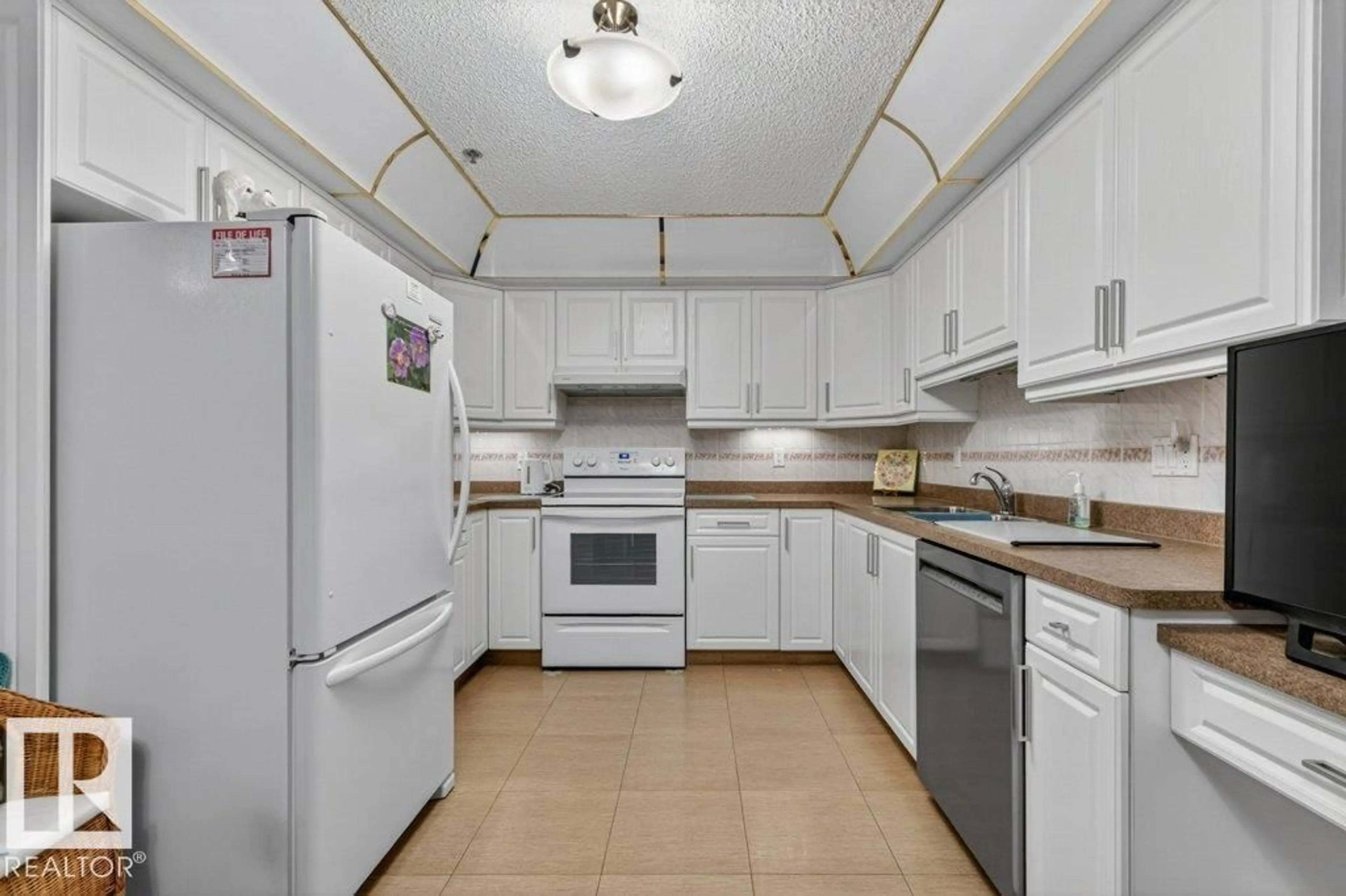 Standard kitchen, ceramic/tile floor for 101 10903 21 AV, Edmonton Alberta T6J7A4