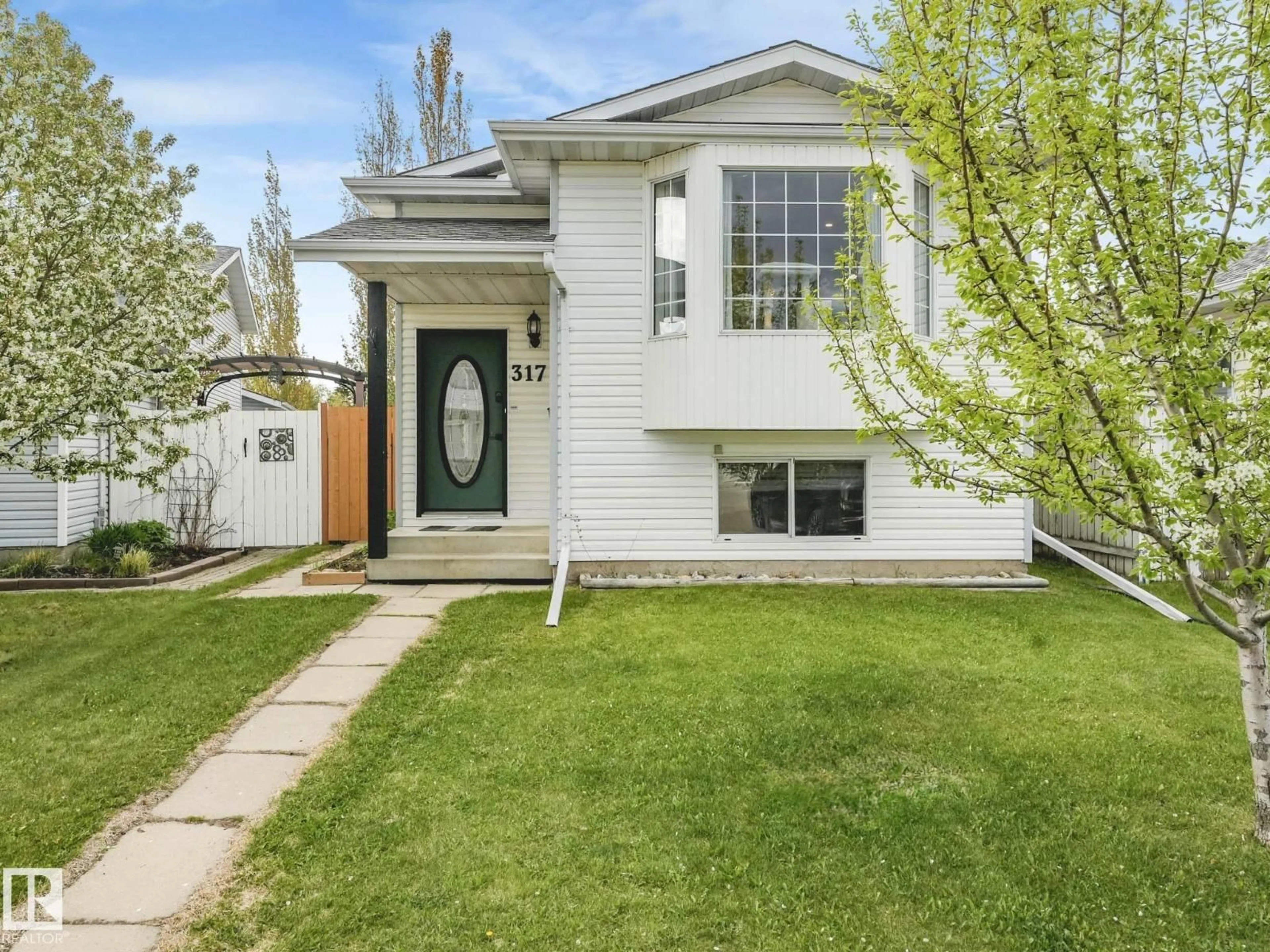 Home with vinyl exterior material, street for 317 KLINE CR, Edmonton Alberta T6L6K8