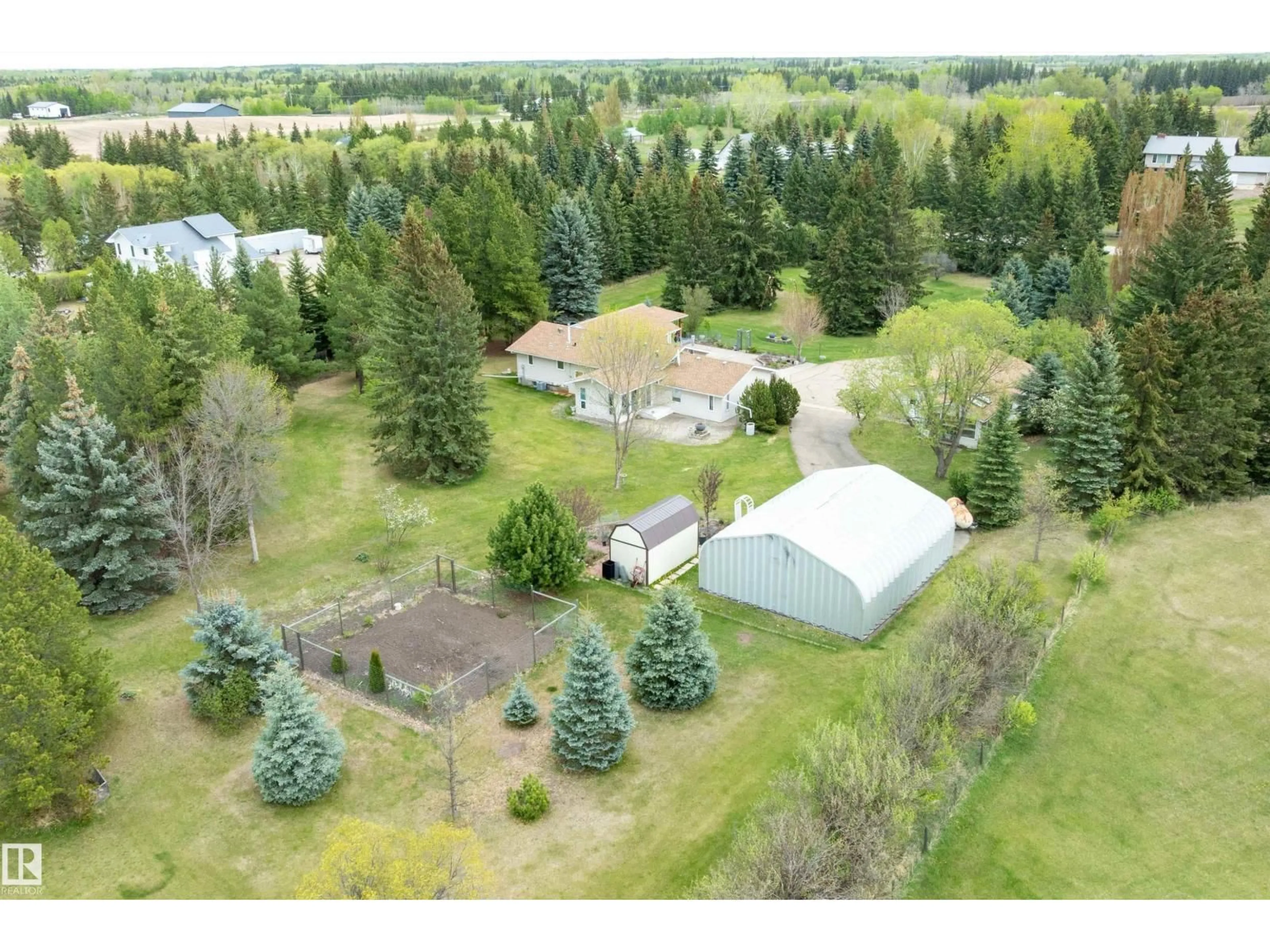 A pic from outside/outdoor area/front of a property/back of a property/a pic from drone, forest/trees view for 27005 - 8 TWP ROAD 511, Rural Parkland County Alberta T7Y1G8