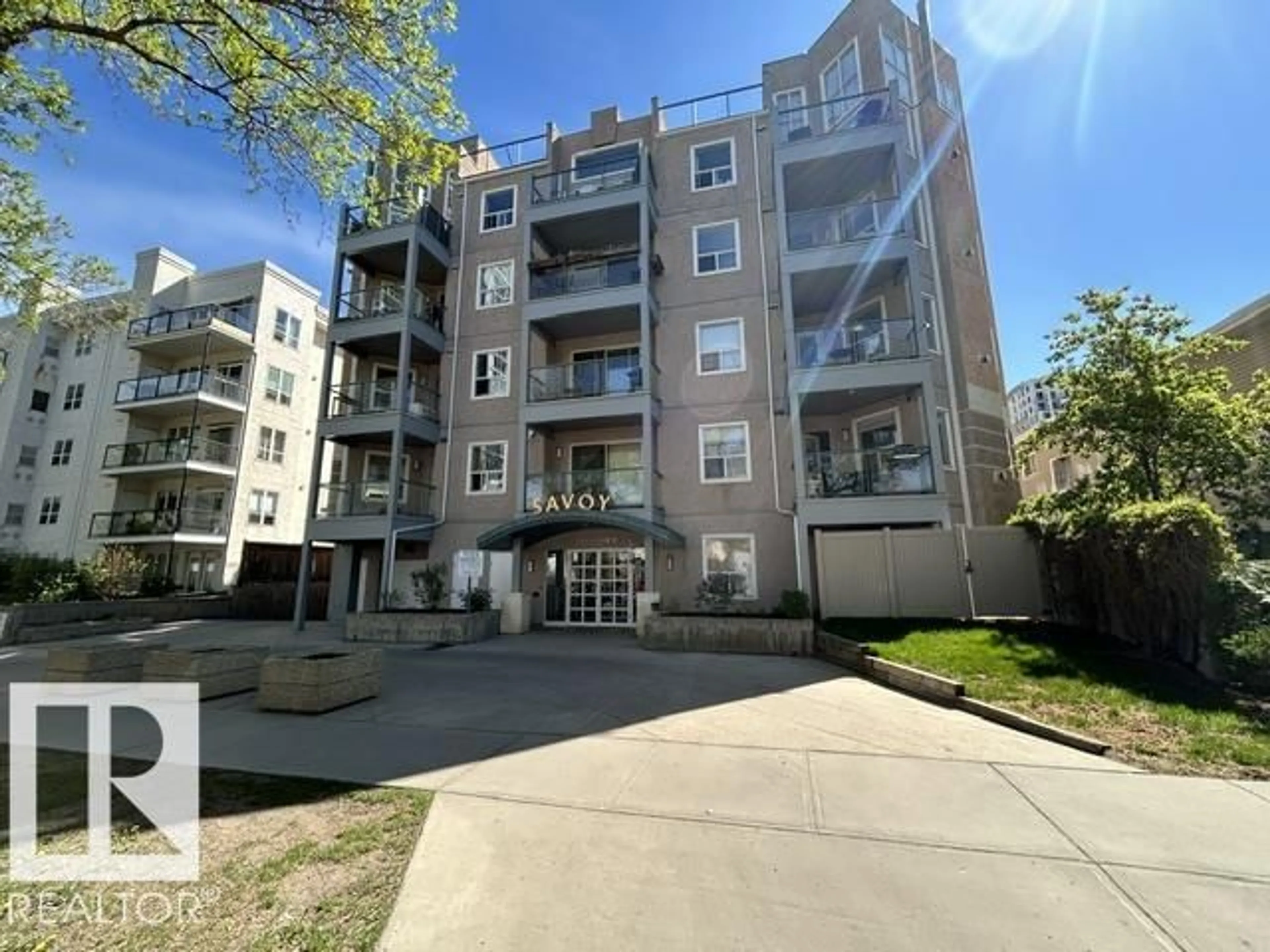 A pic from outside/outdoor area/front of a property/back of a property/a pic from drone, street for #304 - 10011 110 ST, Edmonton Alberta T5K2X1
