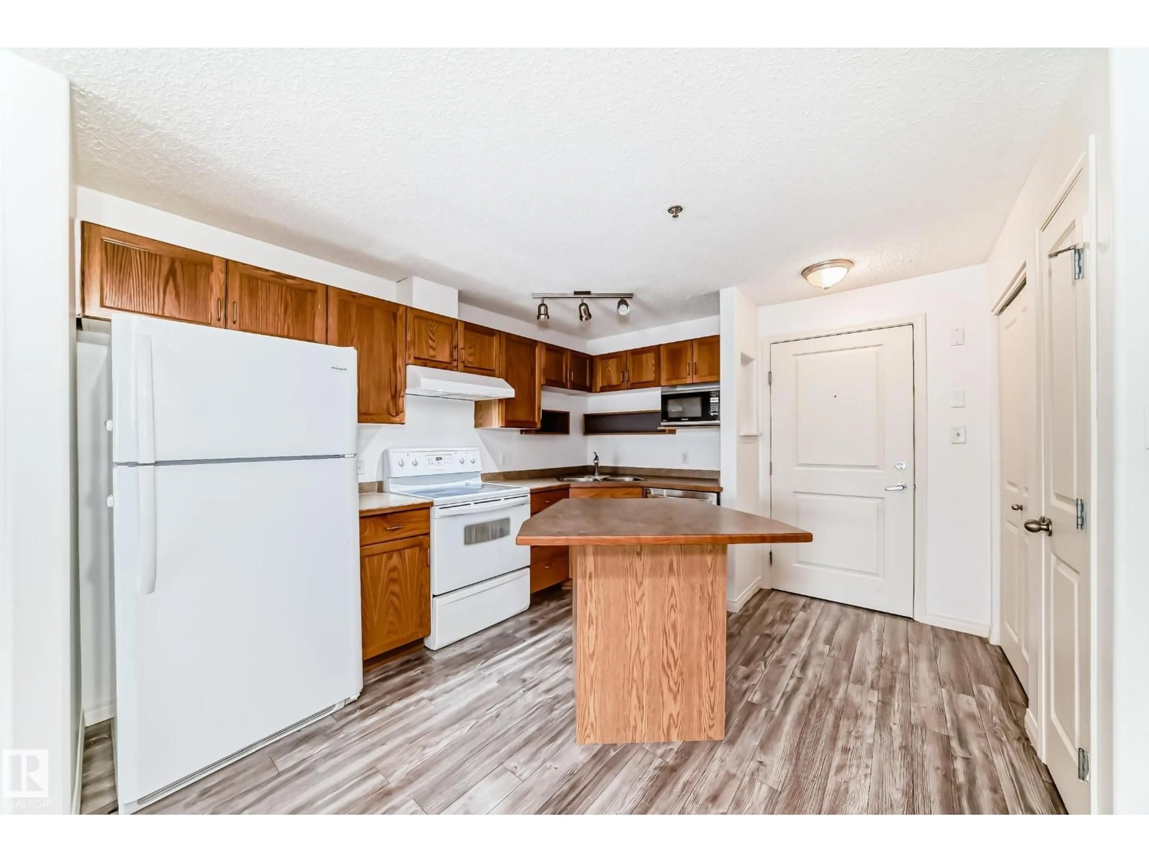 Standard kitchen, wood/laminate floor for 210 - 2305 35A AV, Edmonton Alberta T6T1Z2