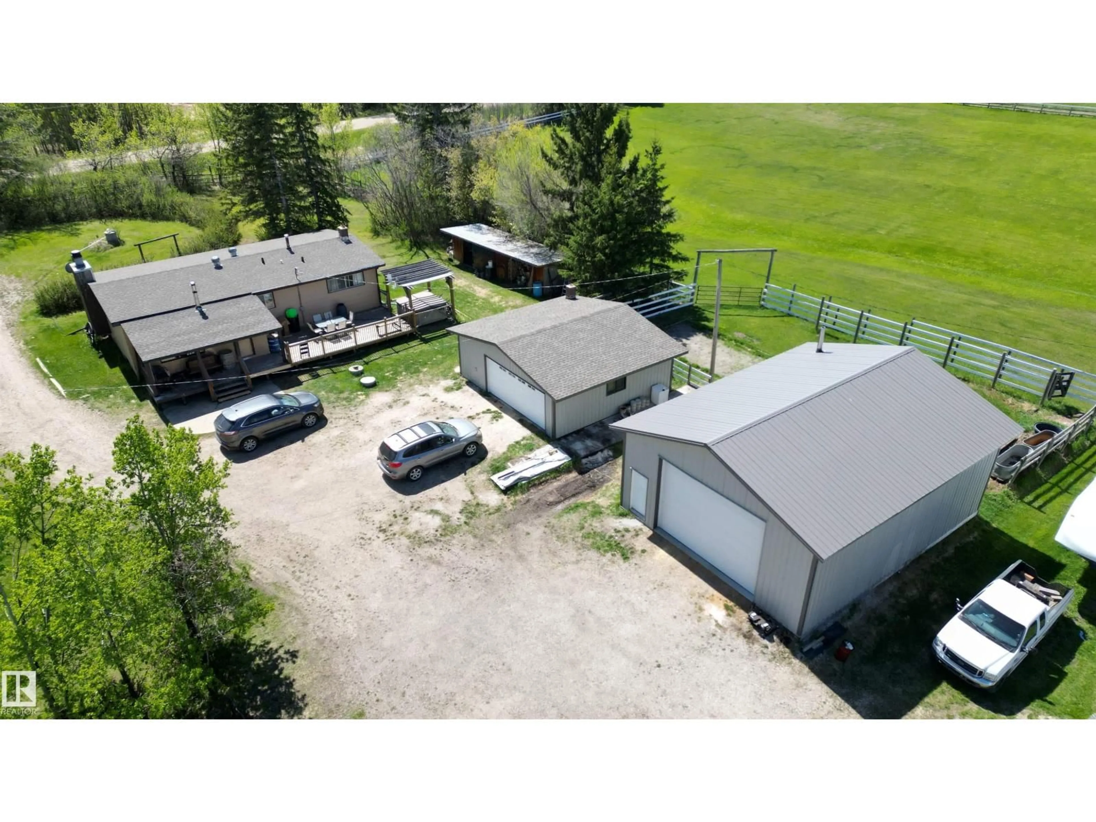 A pic from outside/outdoor area/front of a property/back of a property/a pic from drone, building for 21316 TWP ROAD 534, Rural Strathcona County Alberta T8G2B1