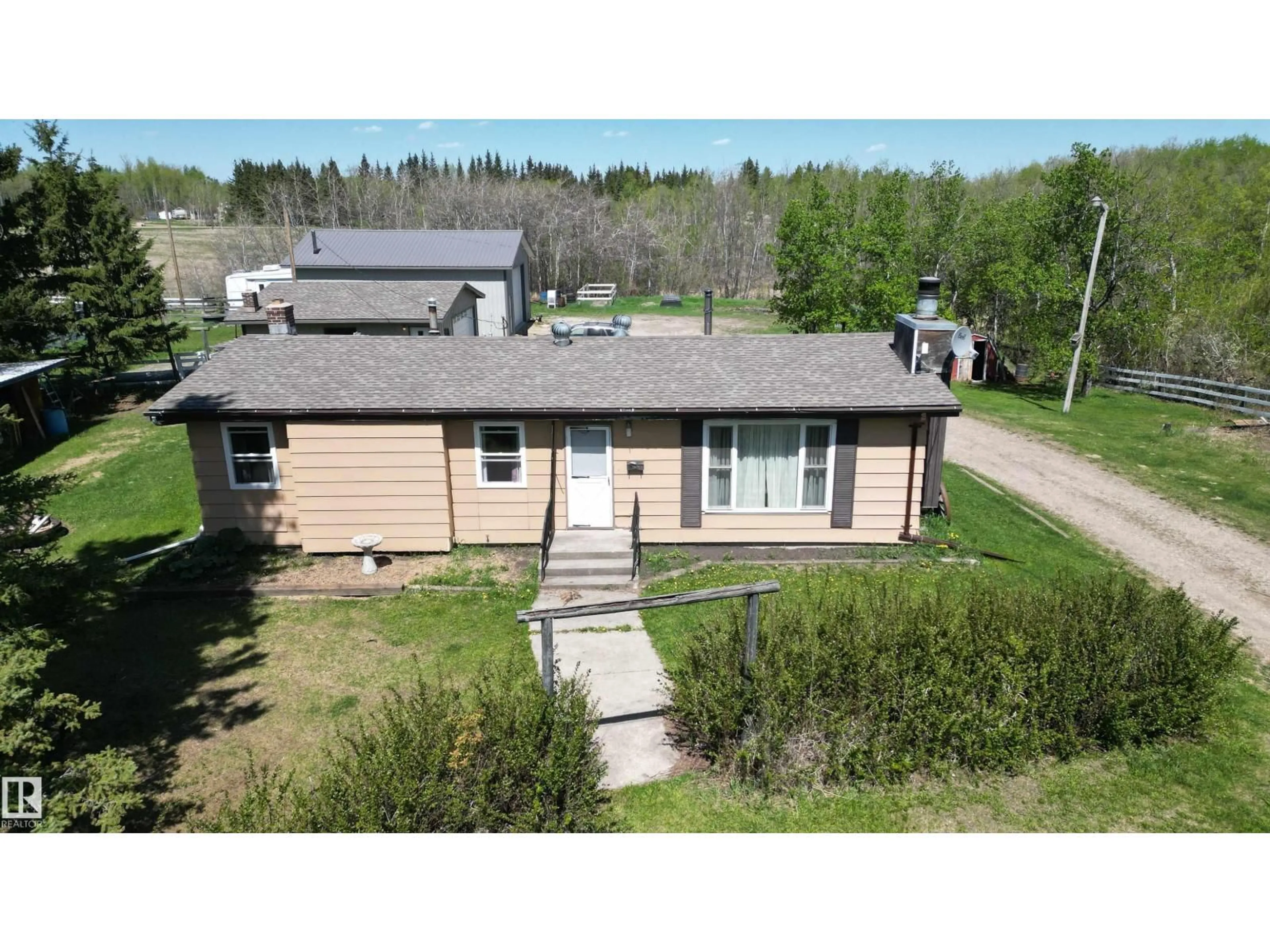 A pic from outside/outdoor area/front of a property/back of a property/a pic from drone, unknown for 21316 TWP ROAD 534, Rural Strathcona County Alberta T8G2B1