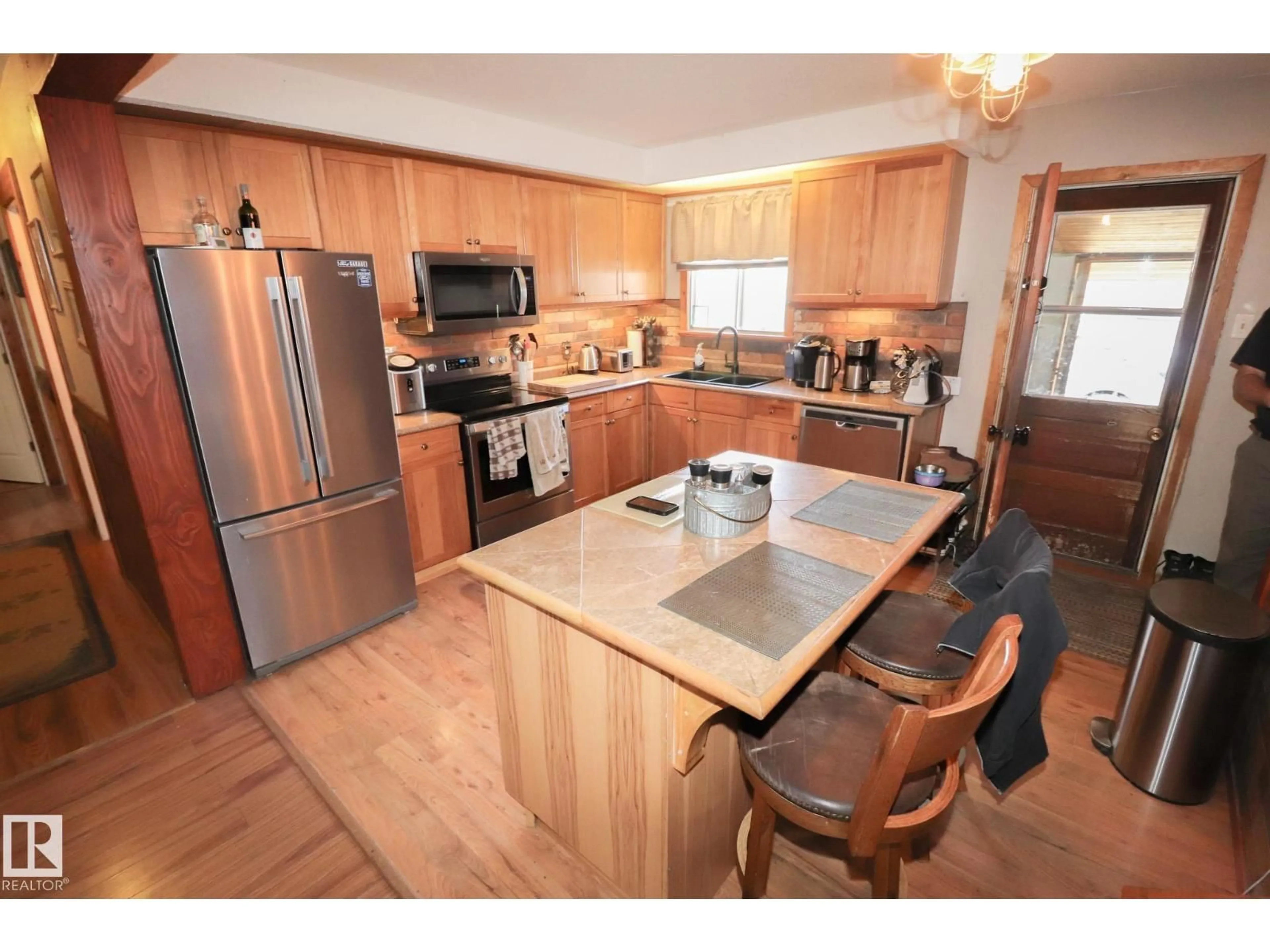 Open concept kitchen, wood/laminate floor for 21316 TWP ROAD 534, Rural Strathcona County Alberta T8G2B1