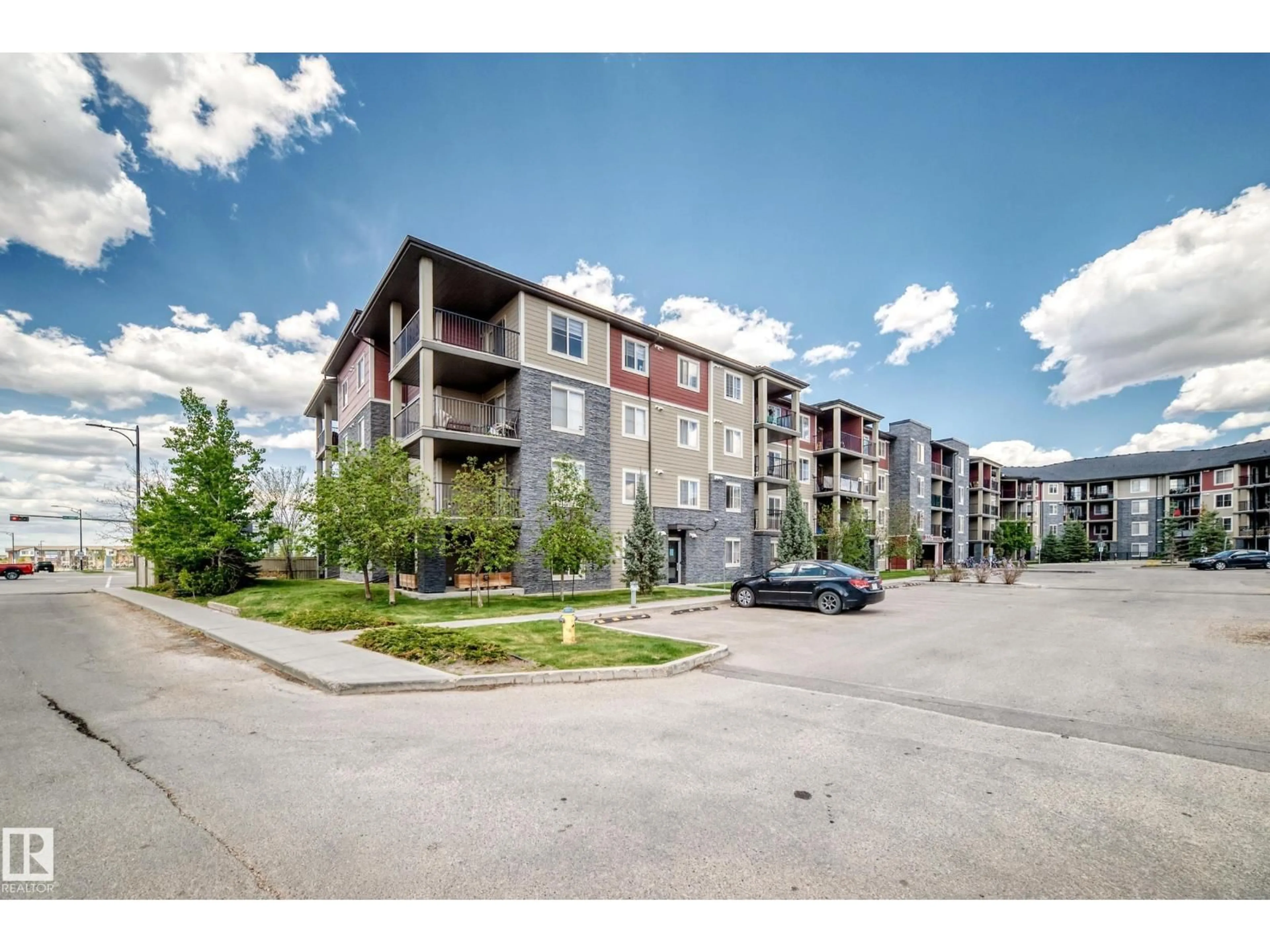 A pic from outside/outdoor area/front of a property/back of a property/a pic from drone, street for 210 JAMES MOWATT TR, Edmonton Alberta T6W3L9