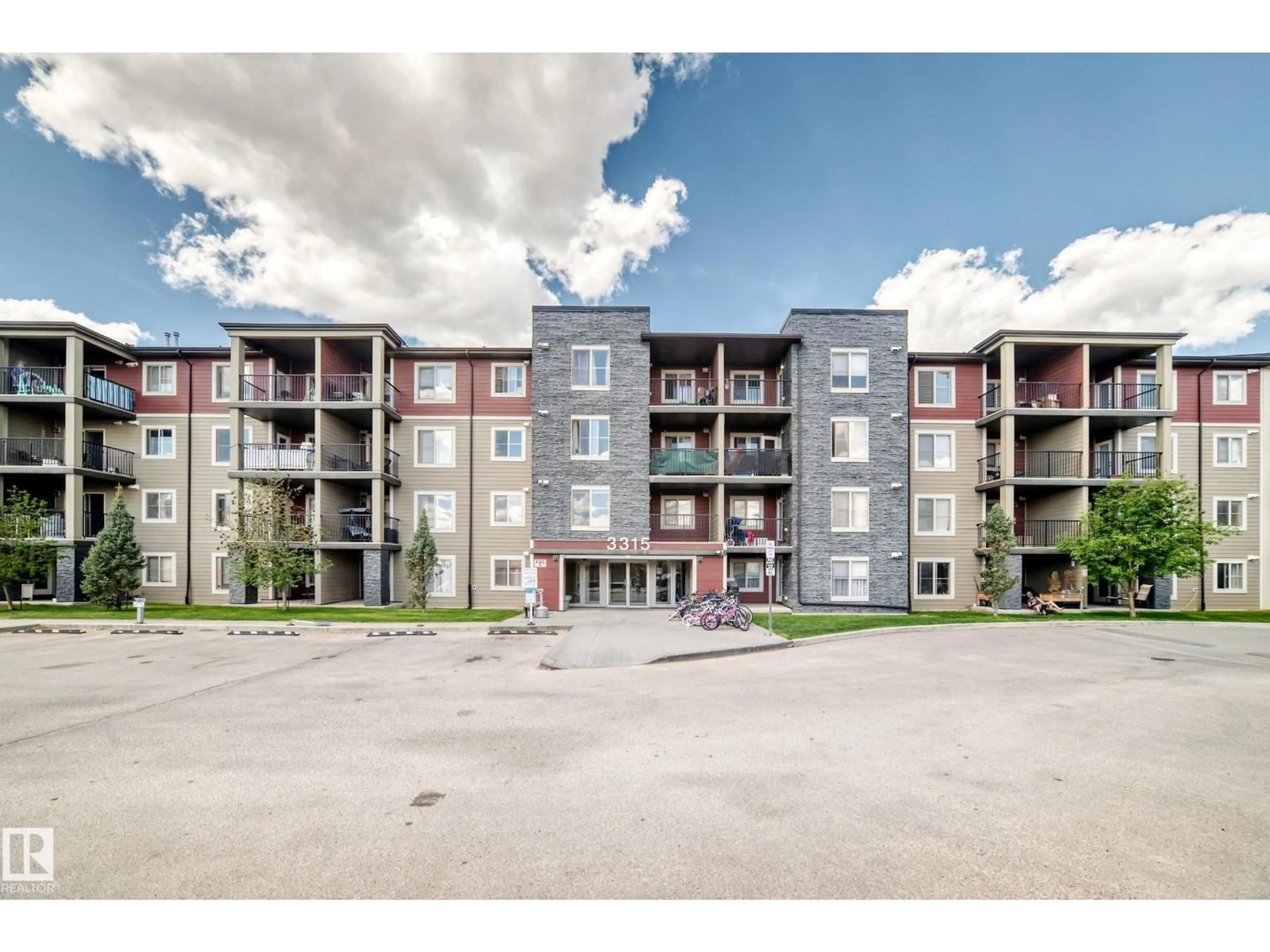A pic from outside/outdoor area/front of a property/back of a property/a pic from drone, building for 210 JAMES MOWATT TR, Edmonton Alberta T6W3L9