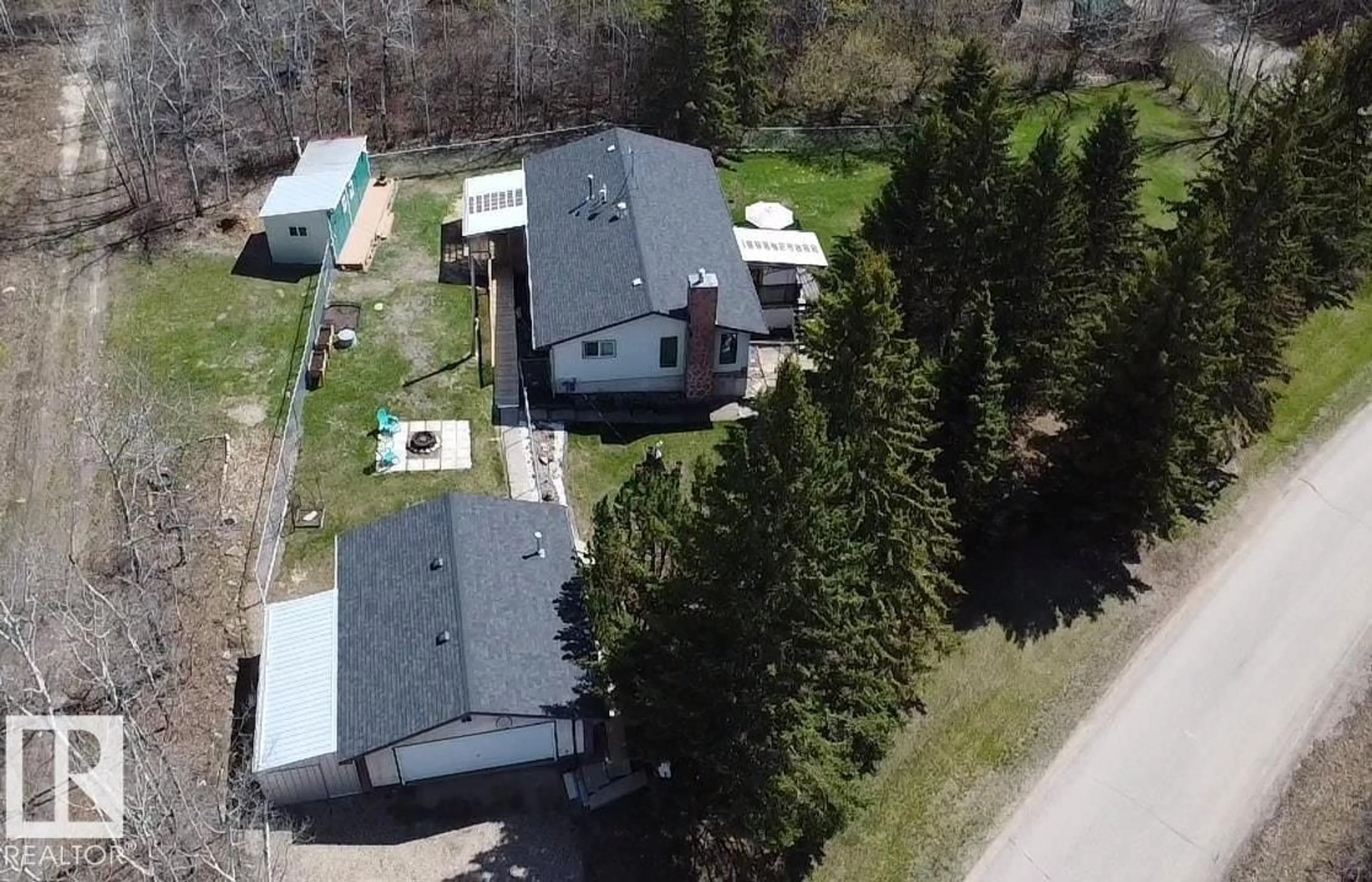 A pic from outside/outdoor area/front of a property/back of a property/a pic from drone, unknown for HI - 840 11013 28, Rural St. Paul County Alberta T0A0C0