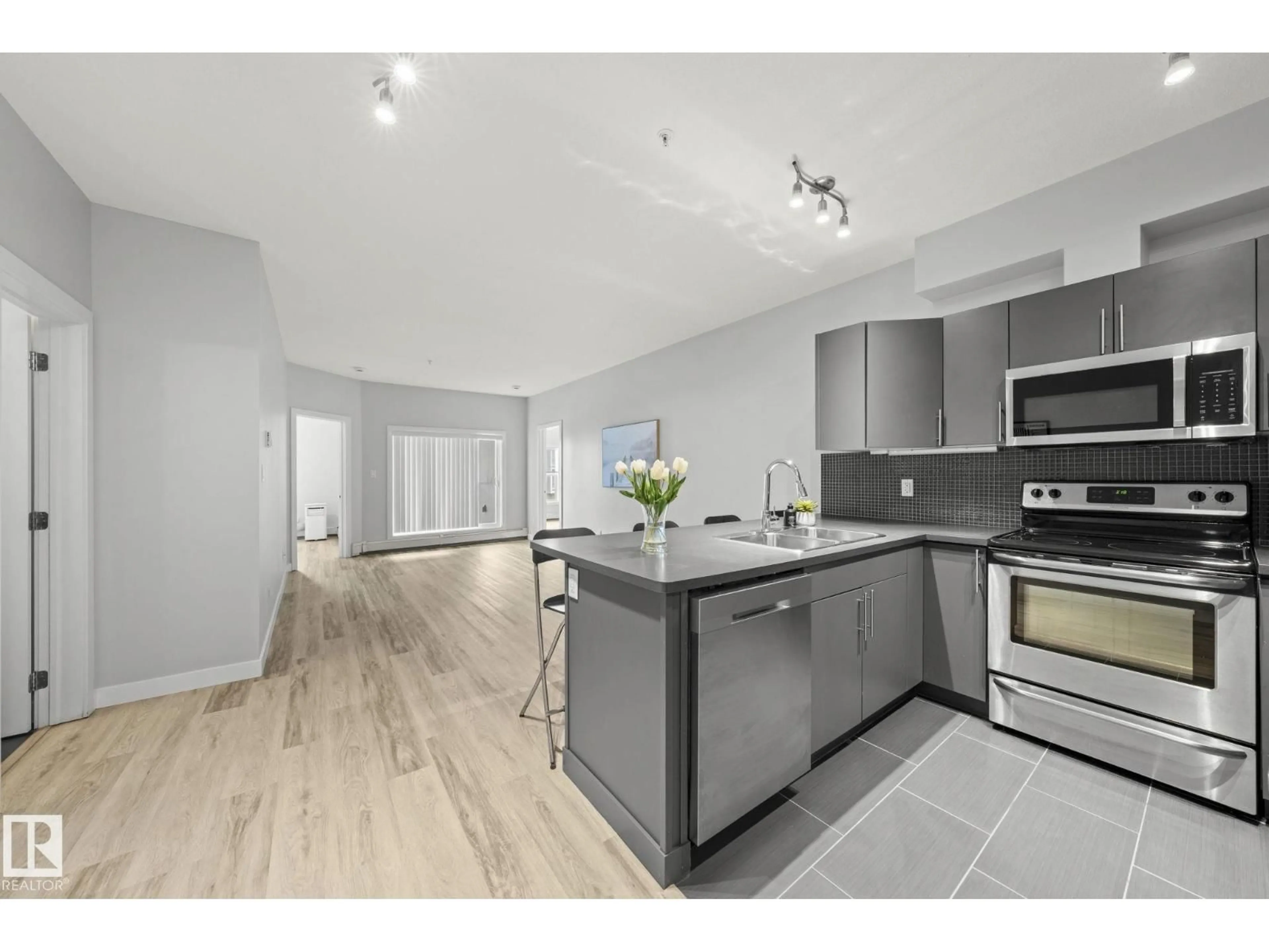 Open concept kitchen, unknown for #306 - 10611 117 ST, Edmonton Alberta T5J2G8