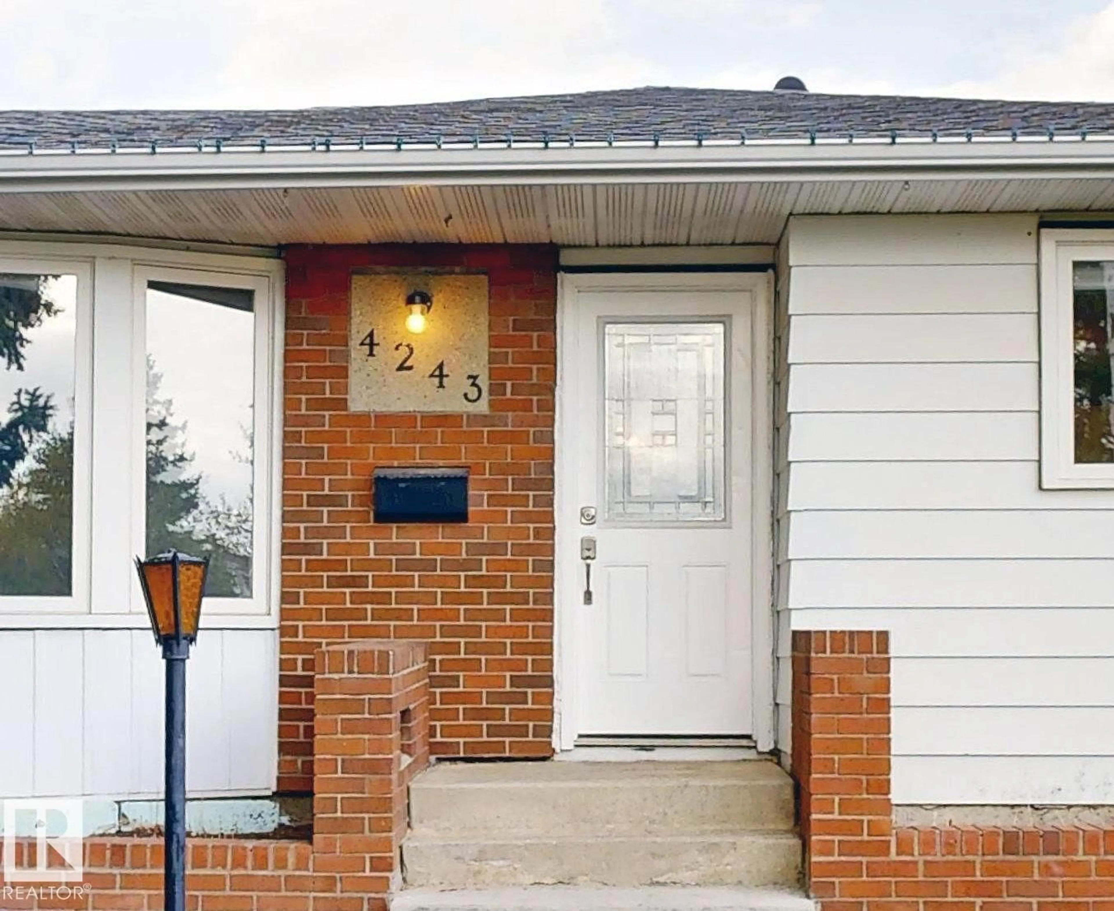 Home with brick exterior material, street for 4243 74 ST, Edmonton Alberta T6K0W1