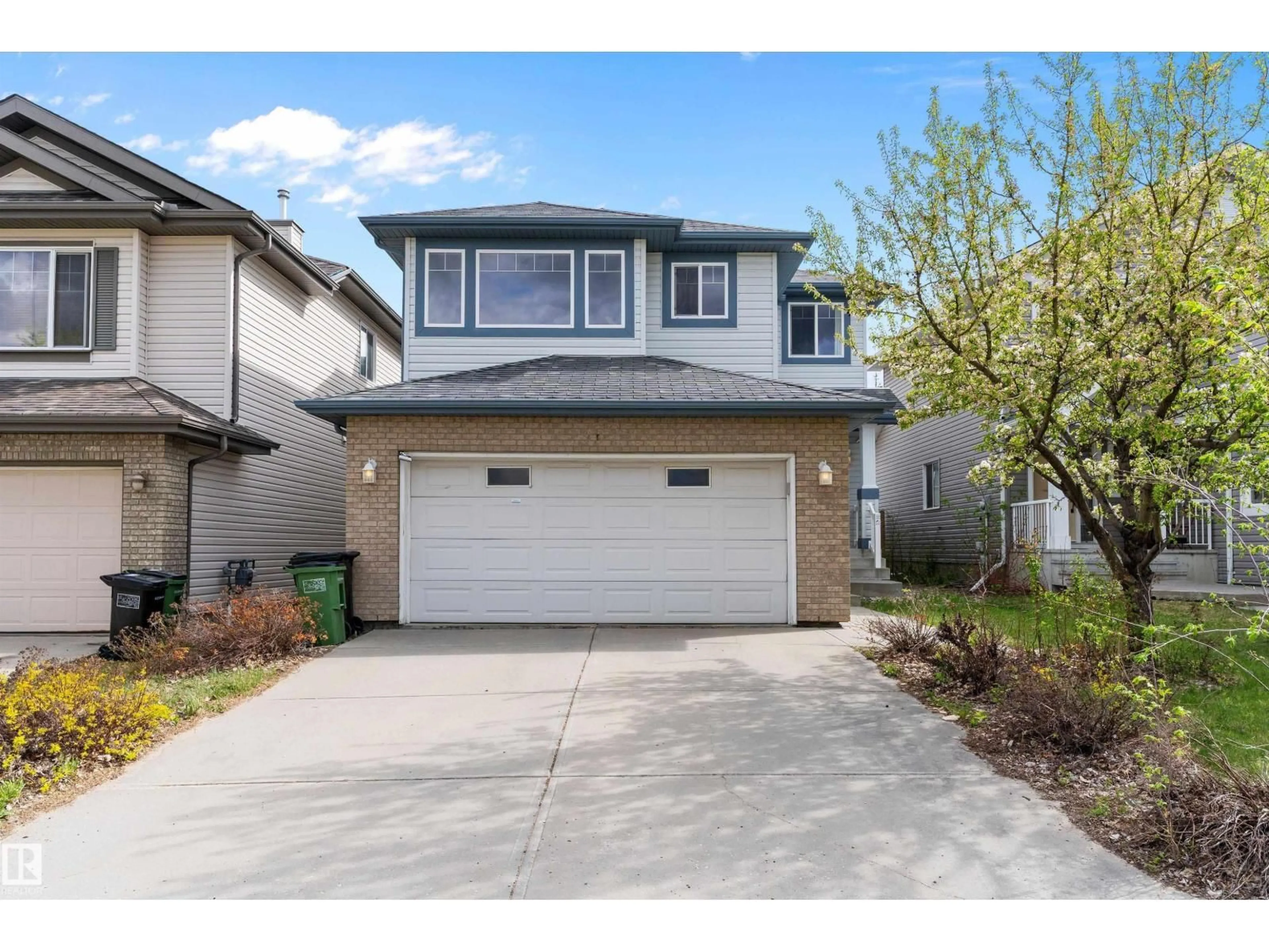 Home with vinyl exterior material, street for 583 LEGER WY, Edmonton Alberta T6R3T5