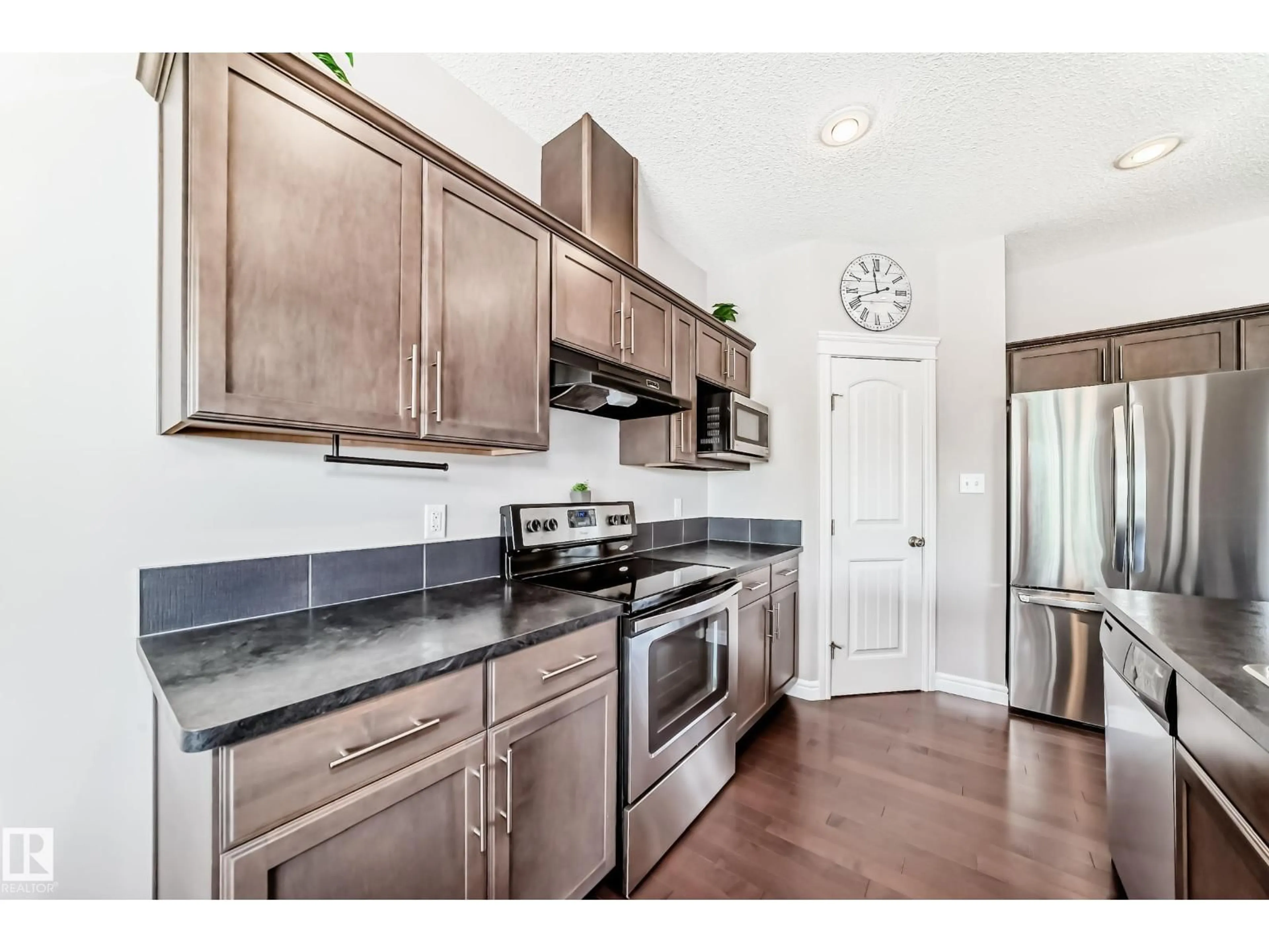 Open concept kitchen, unknown for 57 MEADOWLAND CR, Spruce Grove Alberta T7X0P9