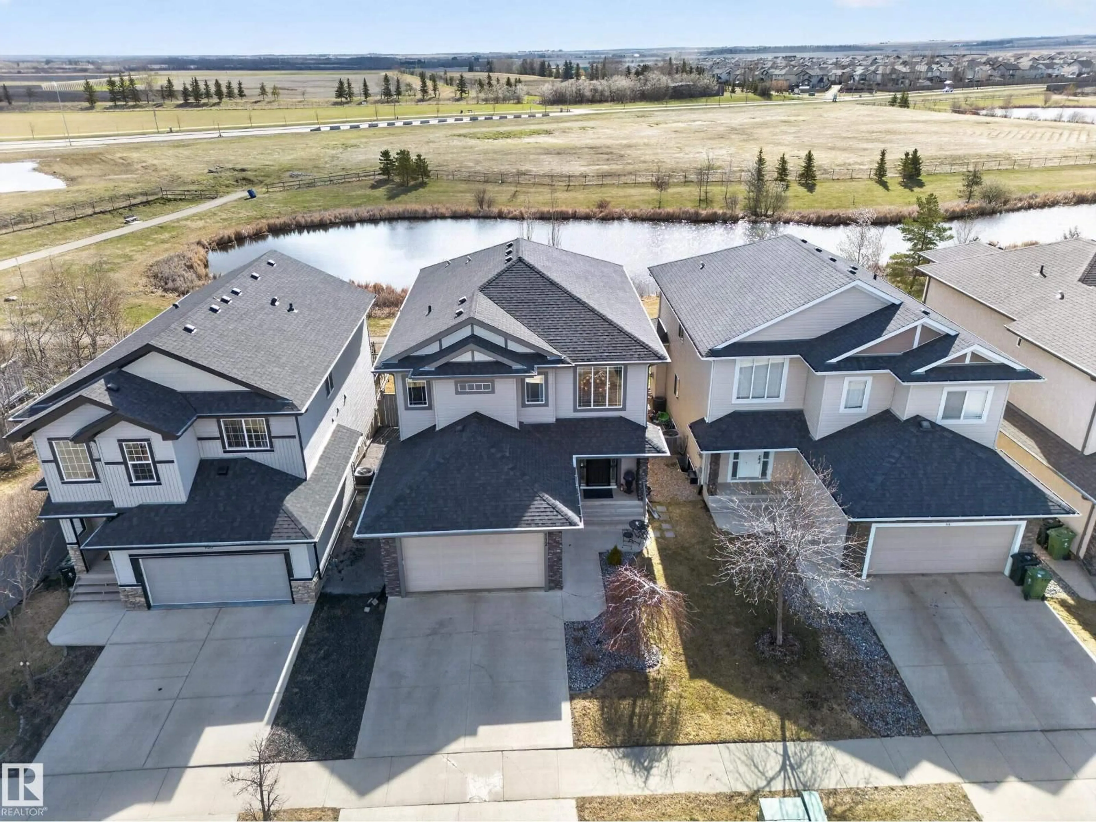 A pic from outside/outdoor area/front of a property/back of a property/a pic from drone, unknown for 112 BREMNER CR, Fort Saskatchewan Alberta T8L0E2