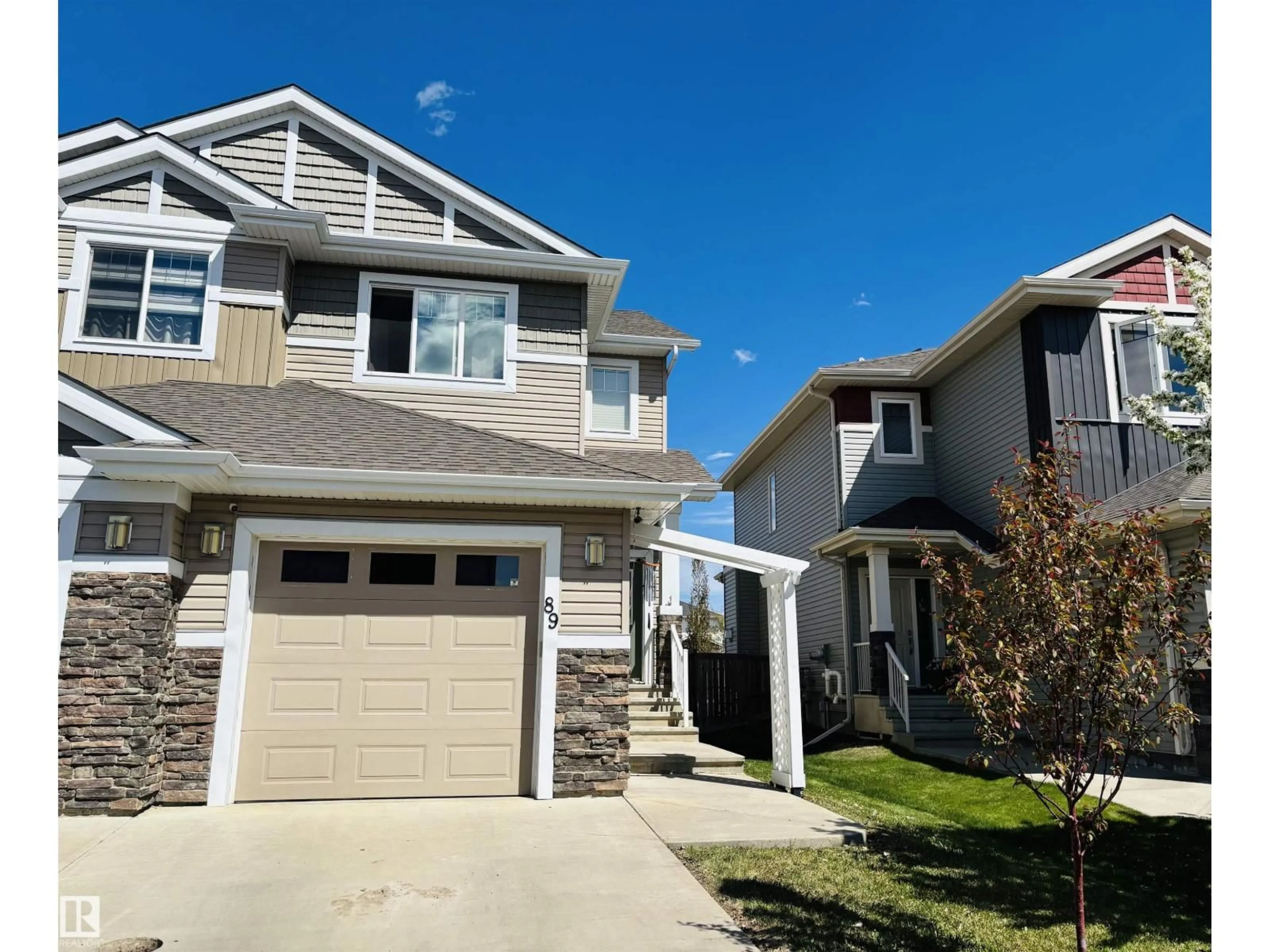 Home with vinyl exterior material, street for 89 SANDALWOOD PLACE, Leduc Alberta T9E1C4