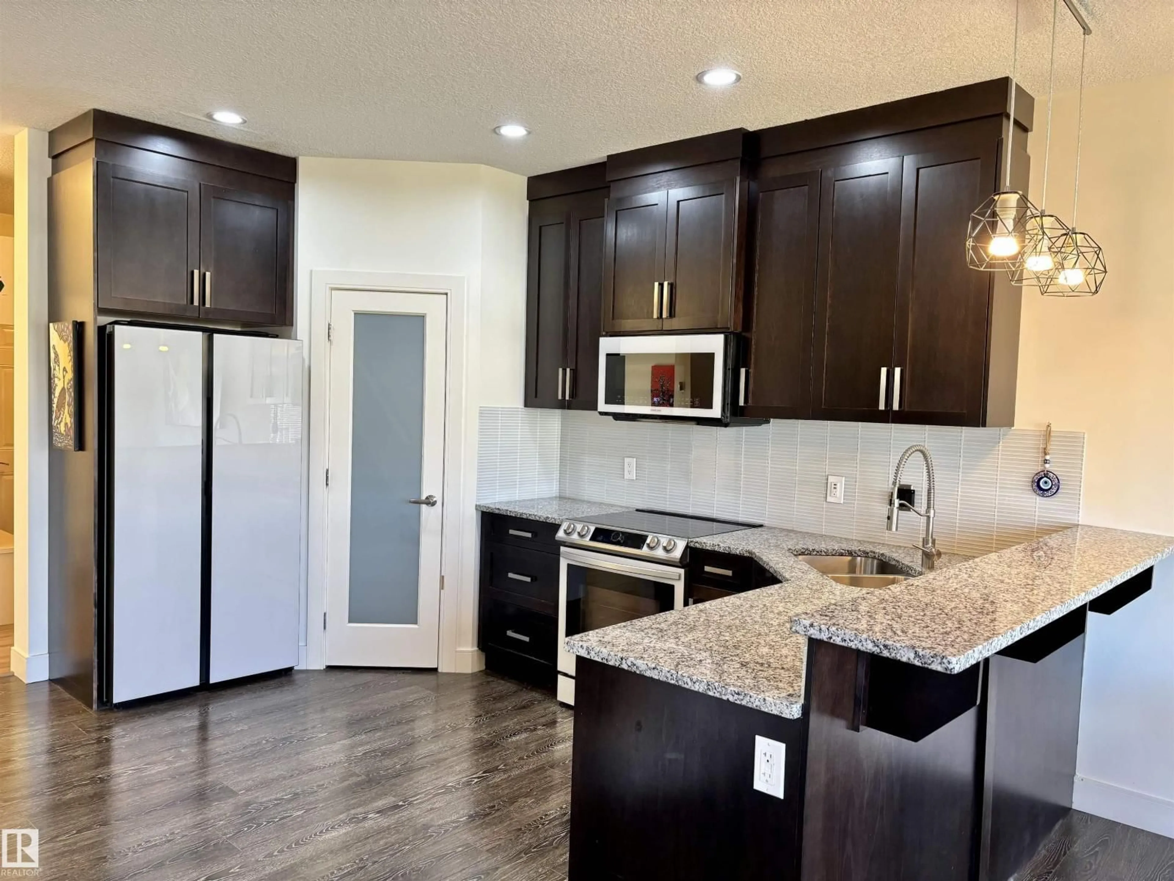 Open concept kitchen, unknown for 89 SANDALWOOD PLACE, Leduc Alberta T9E1C4