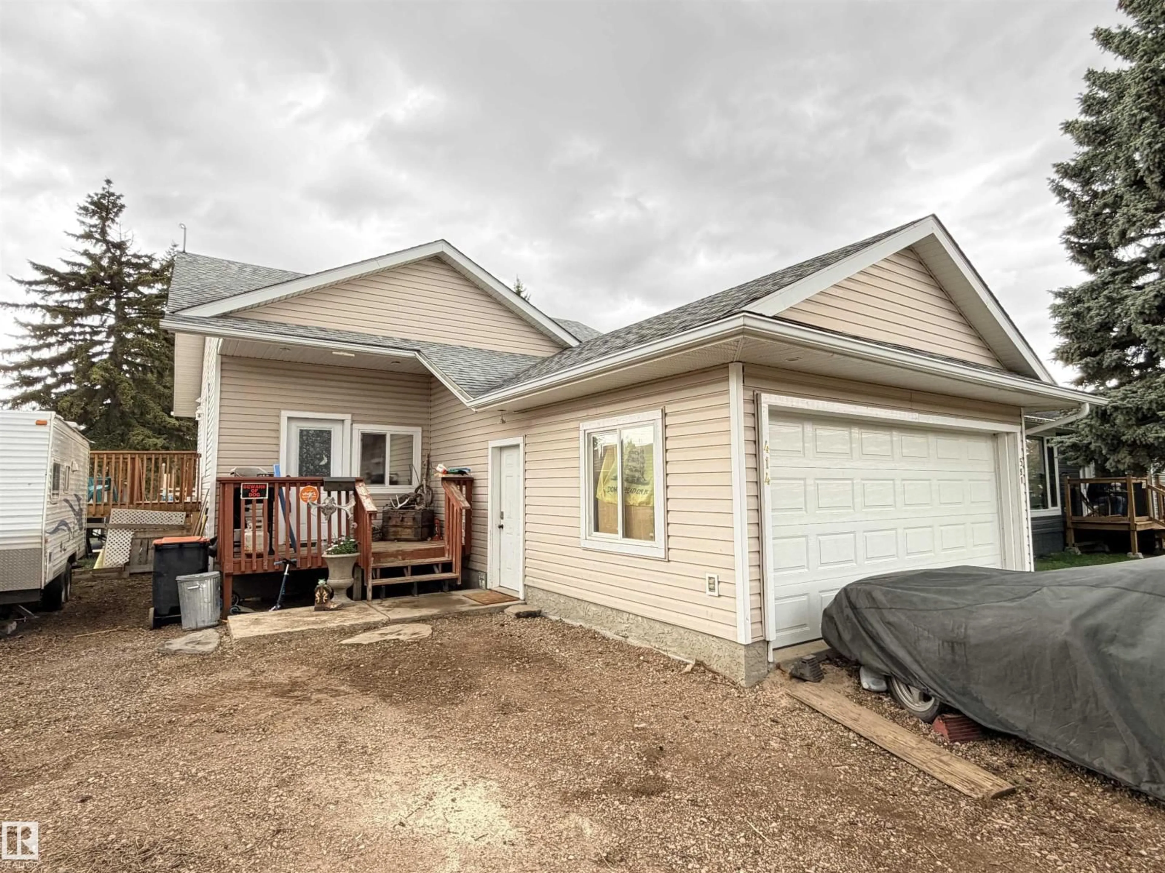 Home with vinyl exterior material, street for 414 5 ST, Thorhild Alberta T0A3J0