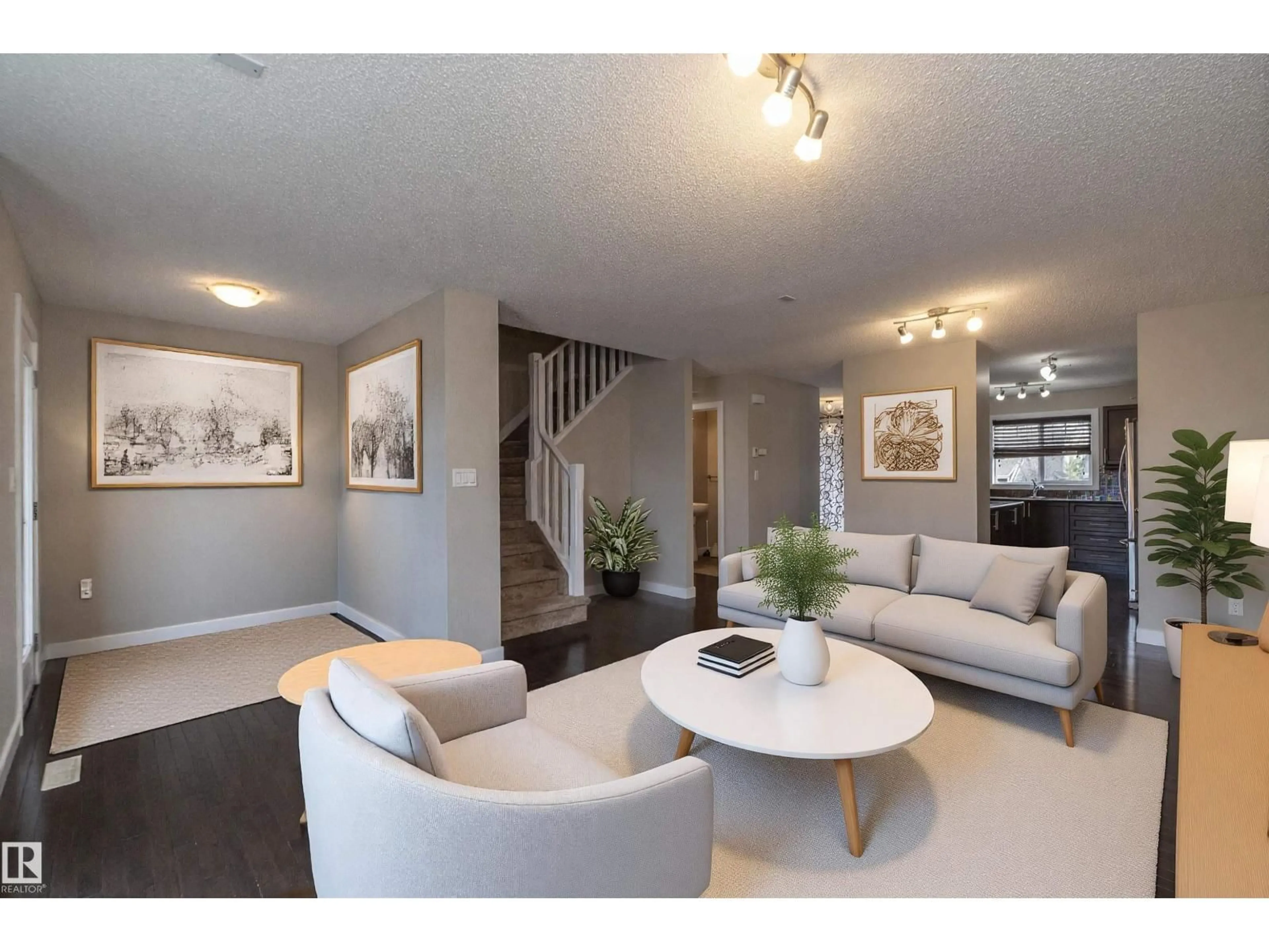 Living room with furniture, wood/laminate floor for 117 CALLAGHAN DR, Edmonton Alberta T6W0J8