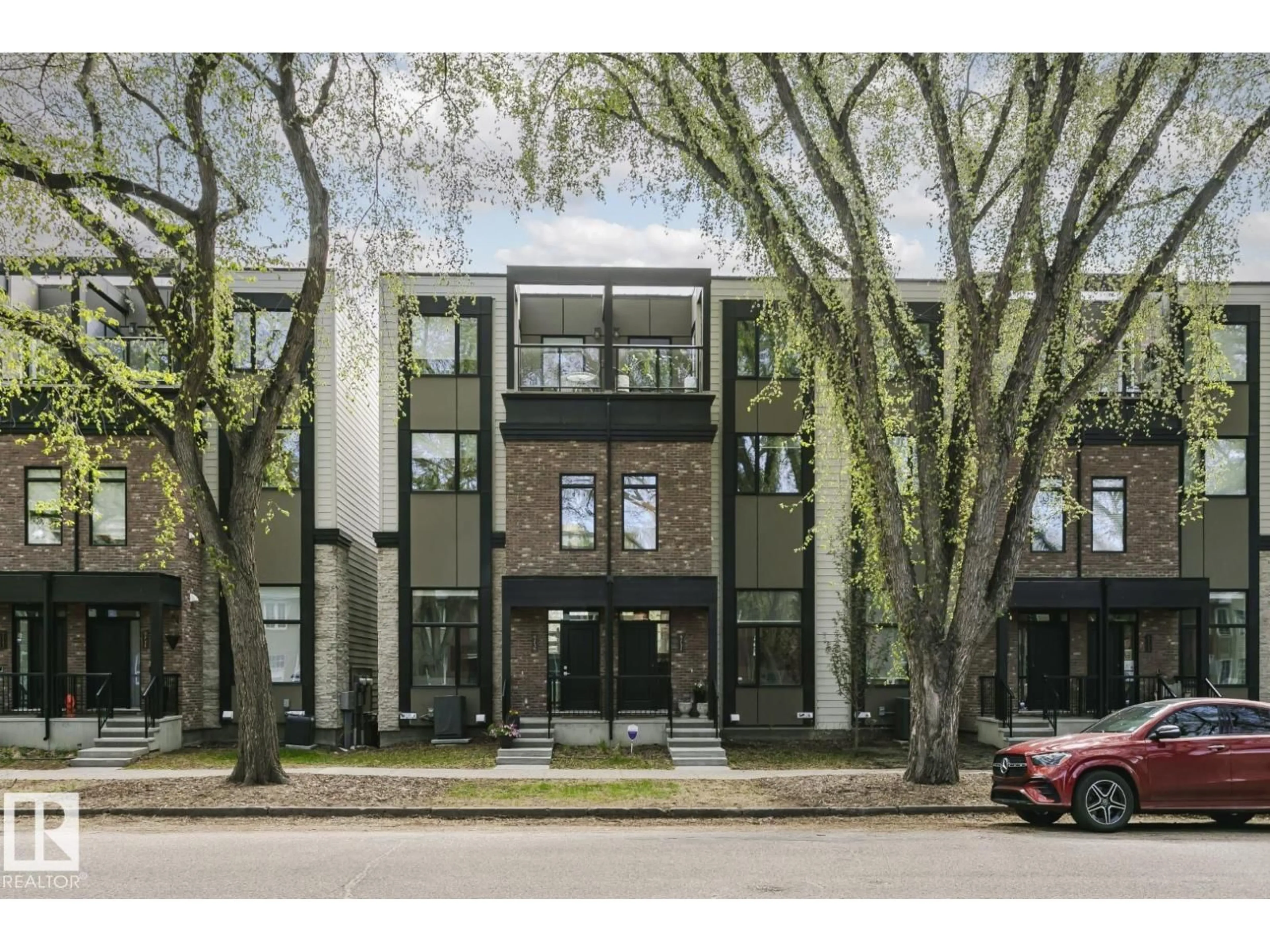 Home with brick exterior material, street for NW - 9737 101 ST, Edmonton Alberta T5K0W9