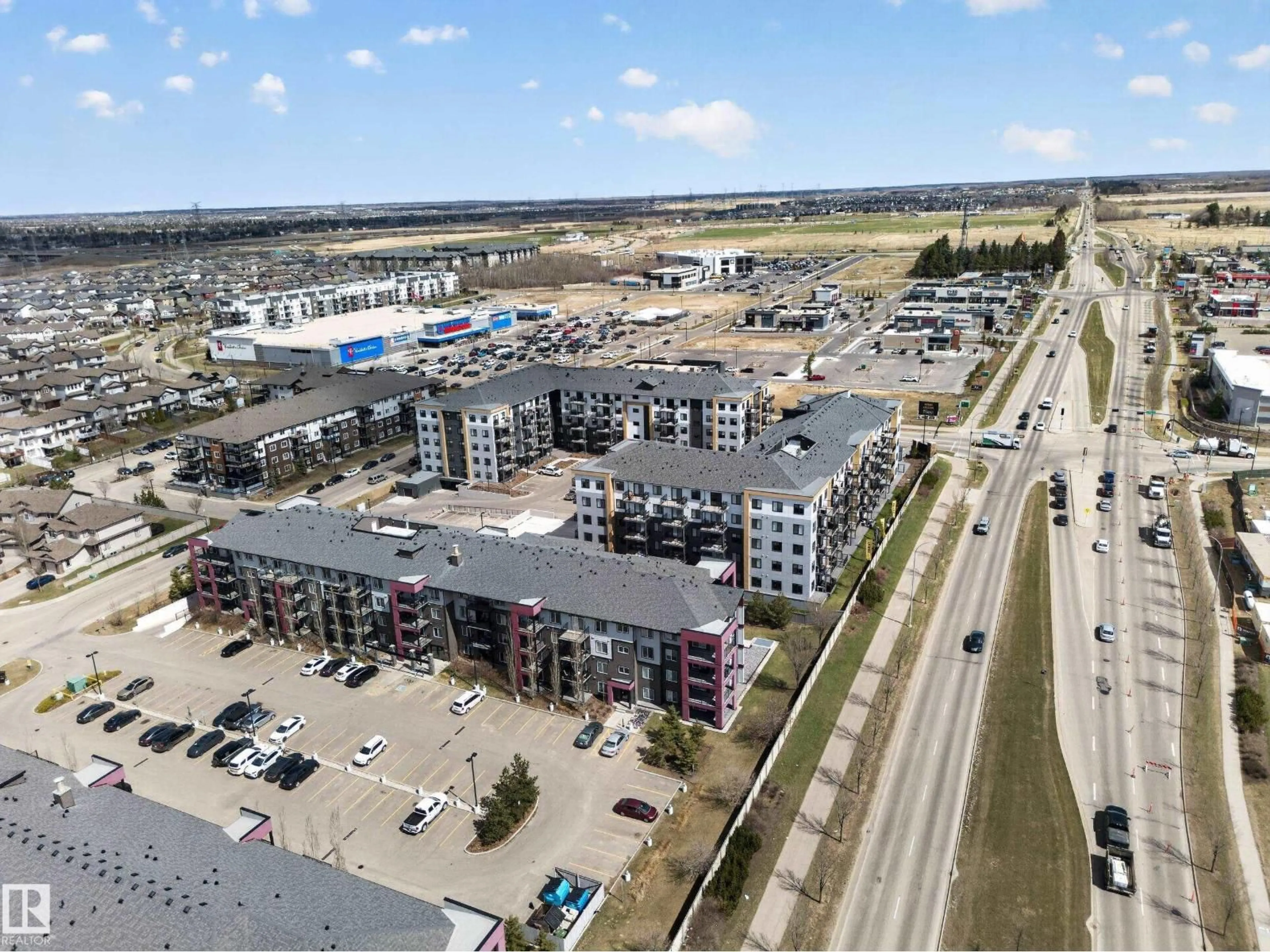 A pic from outside/outdoor area/front of a property/back of a property/a pic from drone, street for 228 5515 7 AVE SW, Edmonton Alberta T6X2A8