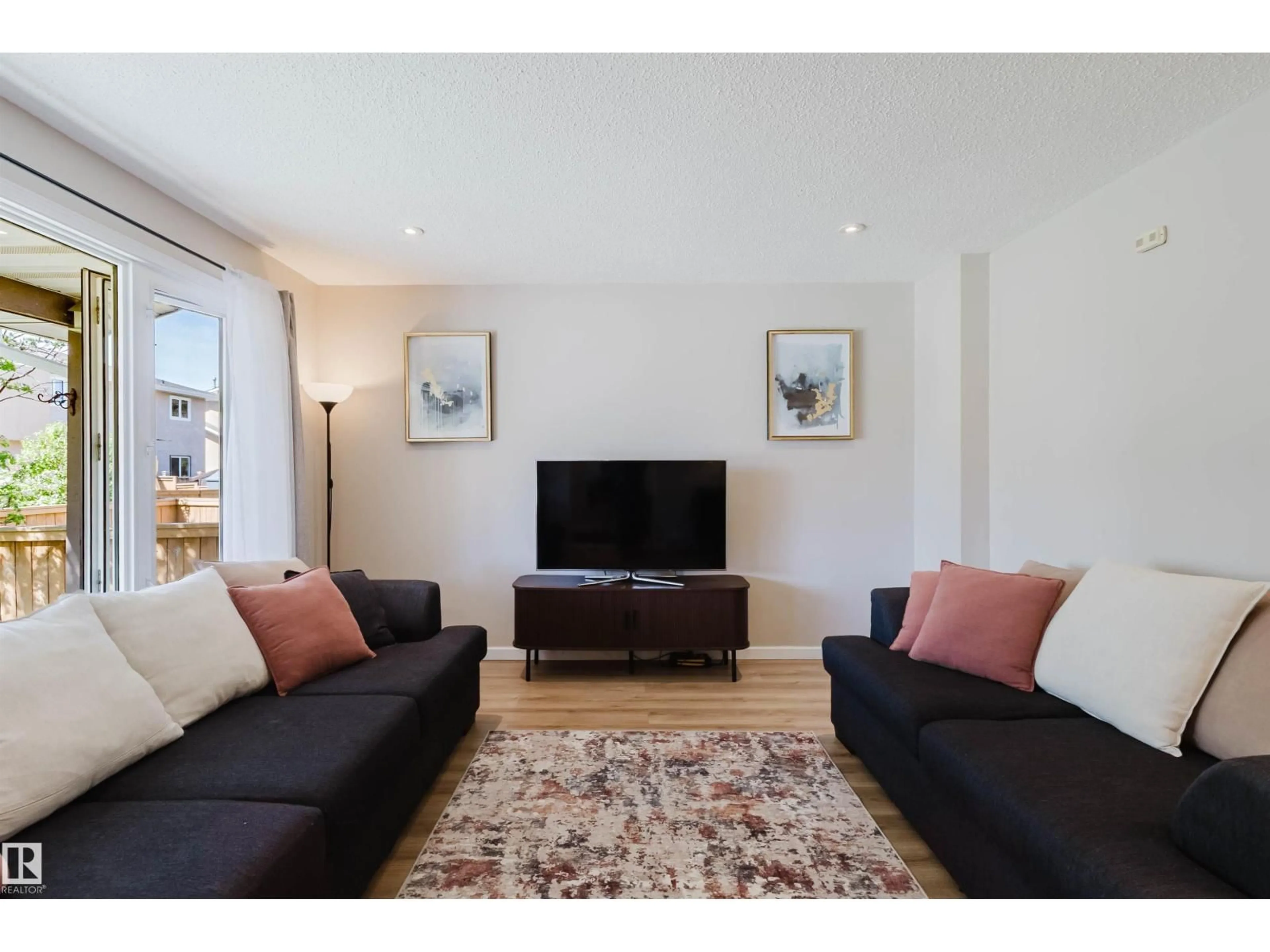 Living room with furniture, unknown for 10946 BEAUMARIS RD, Edmonton Alberta T5X1Z6