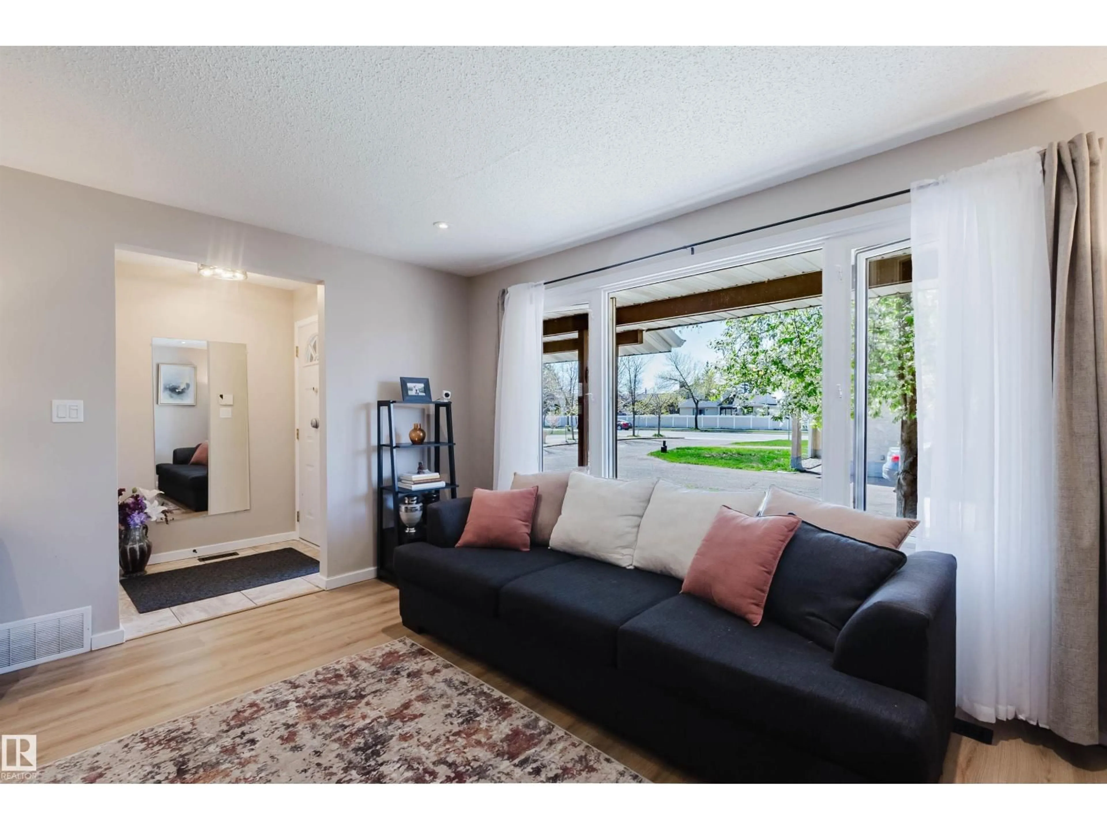 Living room with furniture, unknown for 10946 BEAUMARIS RD, Edmonton Alberta T5X1Z6