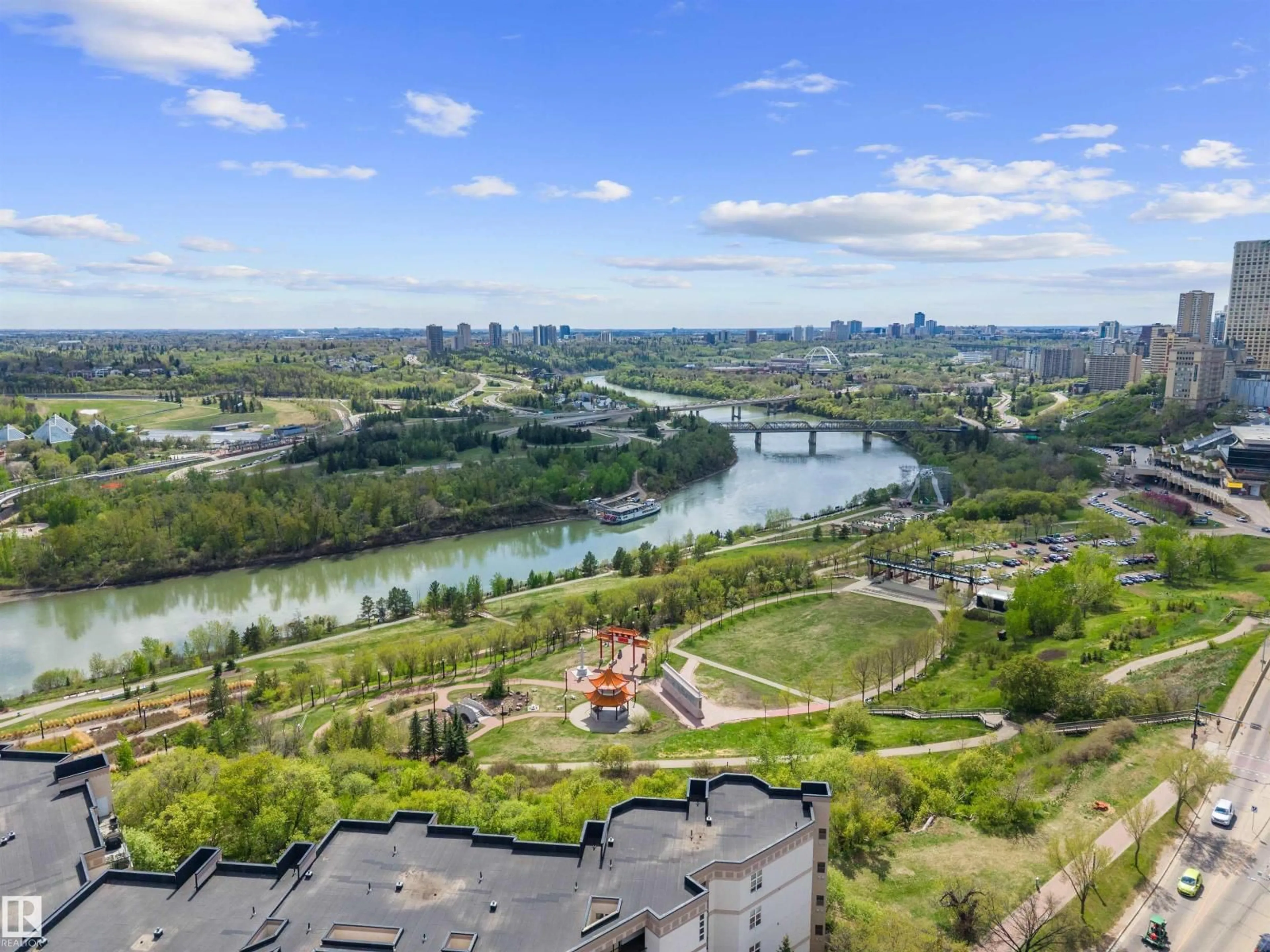 A pic from outside/outdoor area/front of a property/back of a property/a pic from drone, water/lake/river/ocean view for #215 - 9507 101 AV, Edmonton Alberta T5H4R1