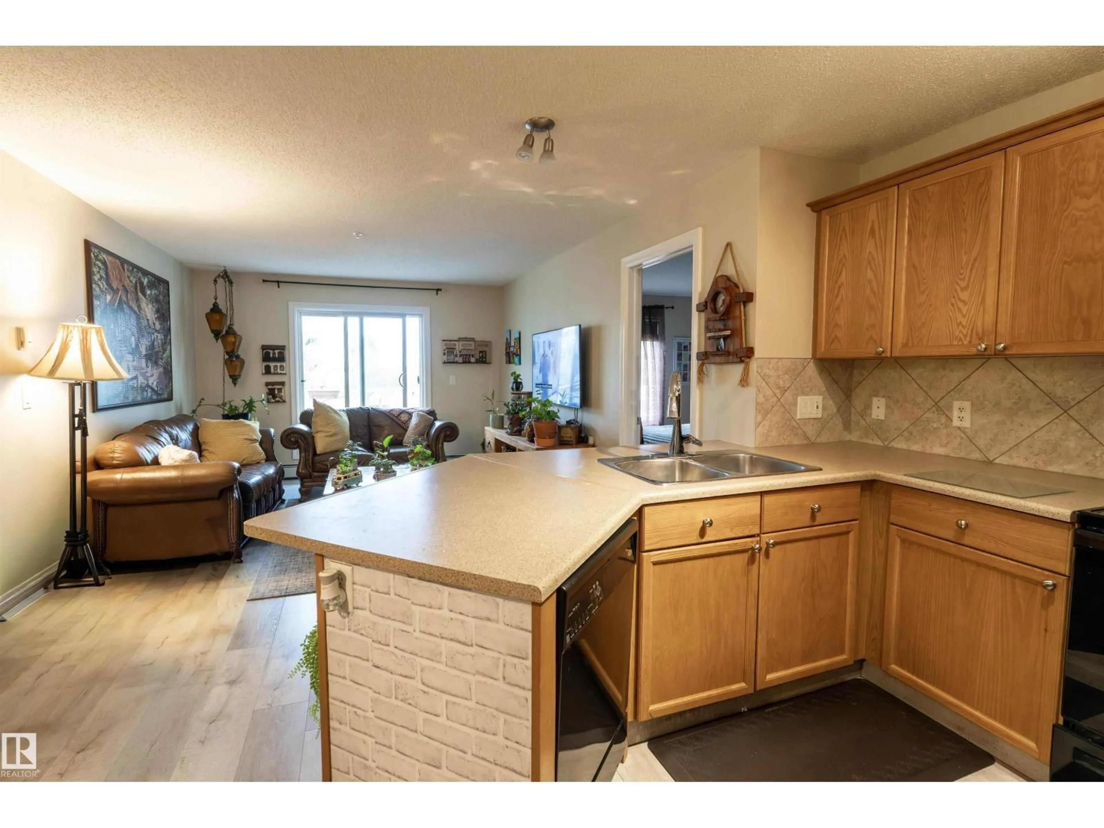 Open concept kitchen, ceramic/tile floor for #203 - 4403 23 ST, Edmonton Alberta T6T0E4