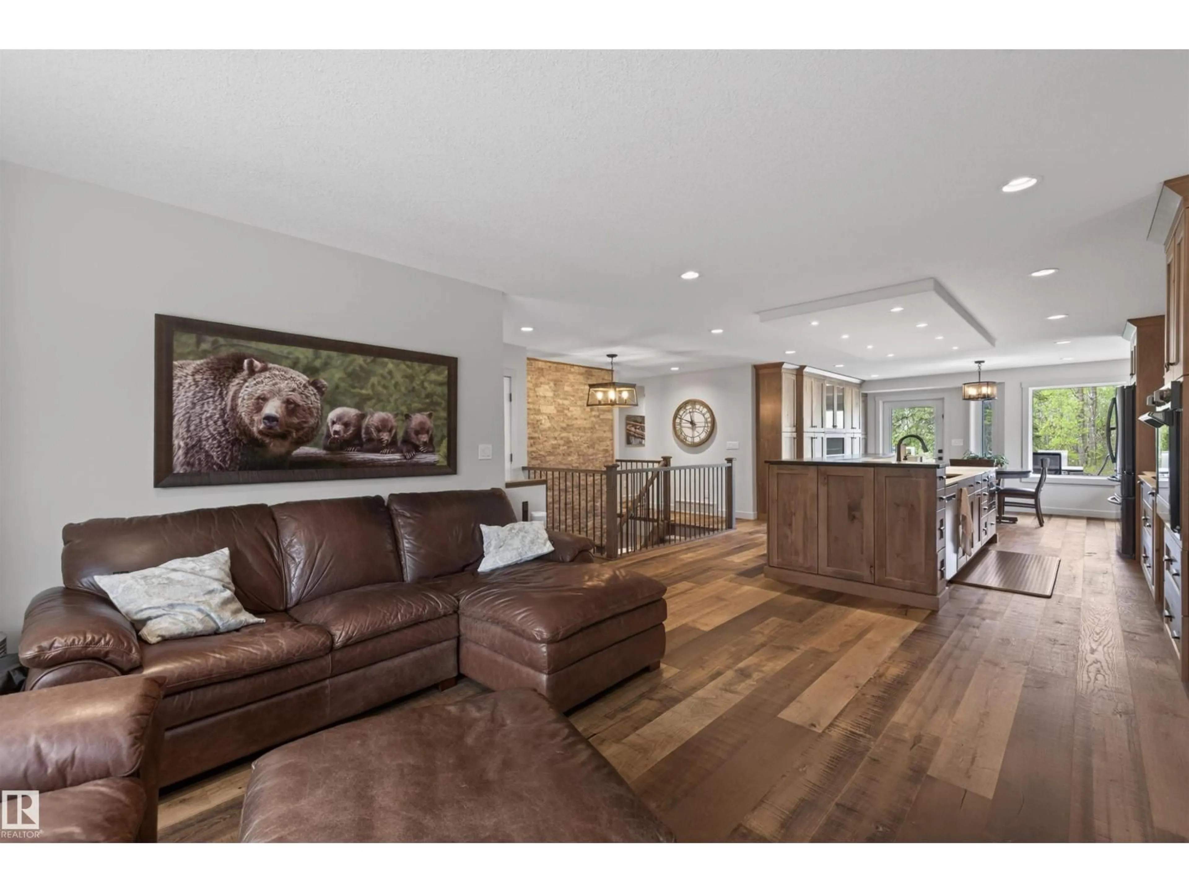 Living room with furniture, wood/laminate floor for 51574 RGE ROAD 225A, Rural Strathcona County Alberta T8C1H5