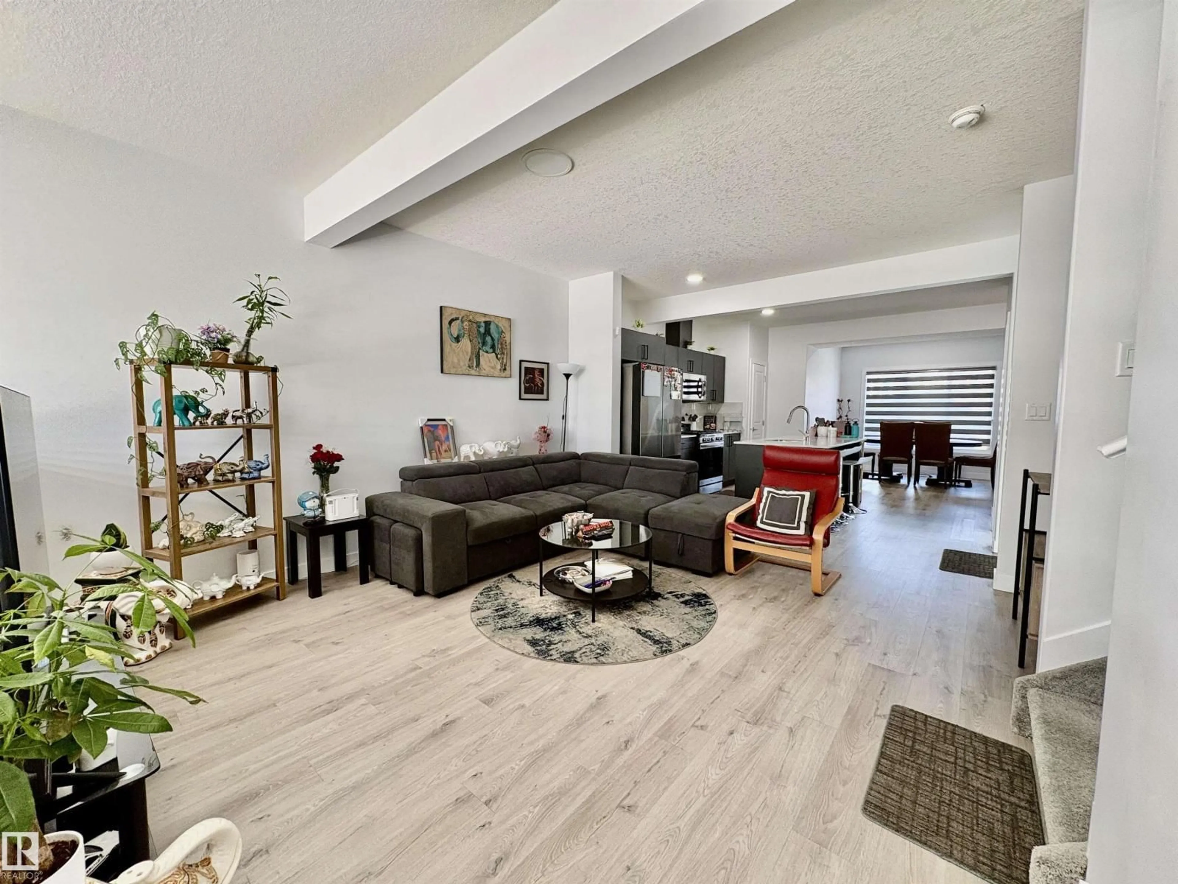 Living room with furniture, unknown for 1203 EATON LN, Edmonton Alberta T6M1M9