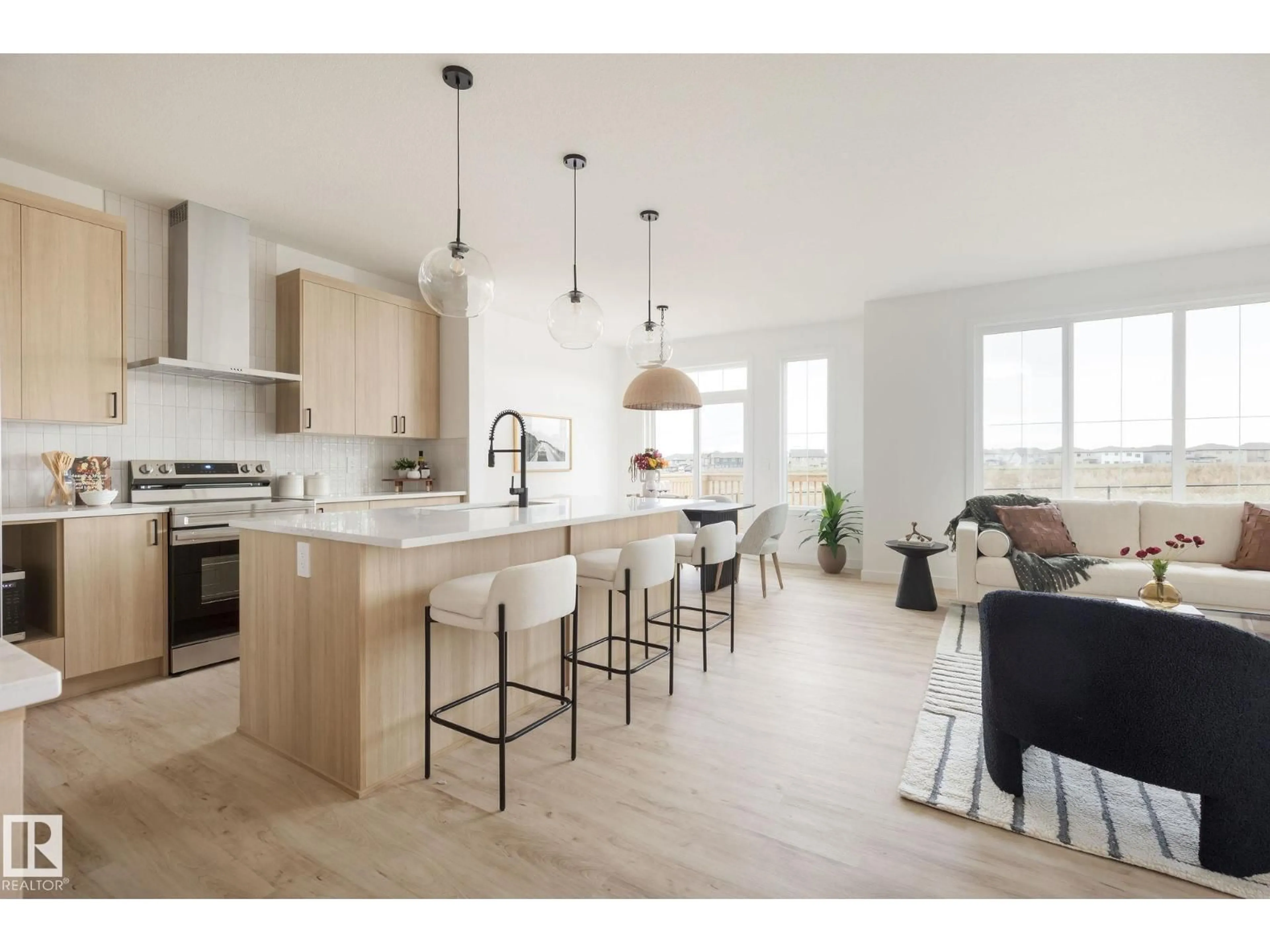 Open concept kitchen, wood/laminate floor for 23 CESSY ST, St. Albert Alberta T8T2E2