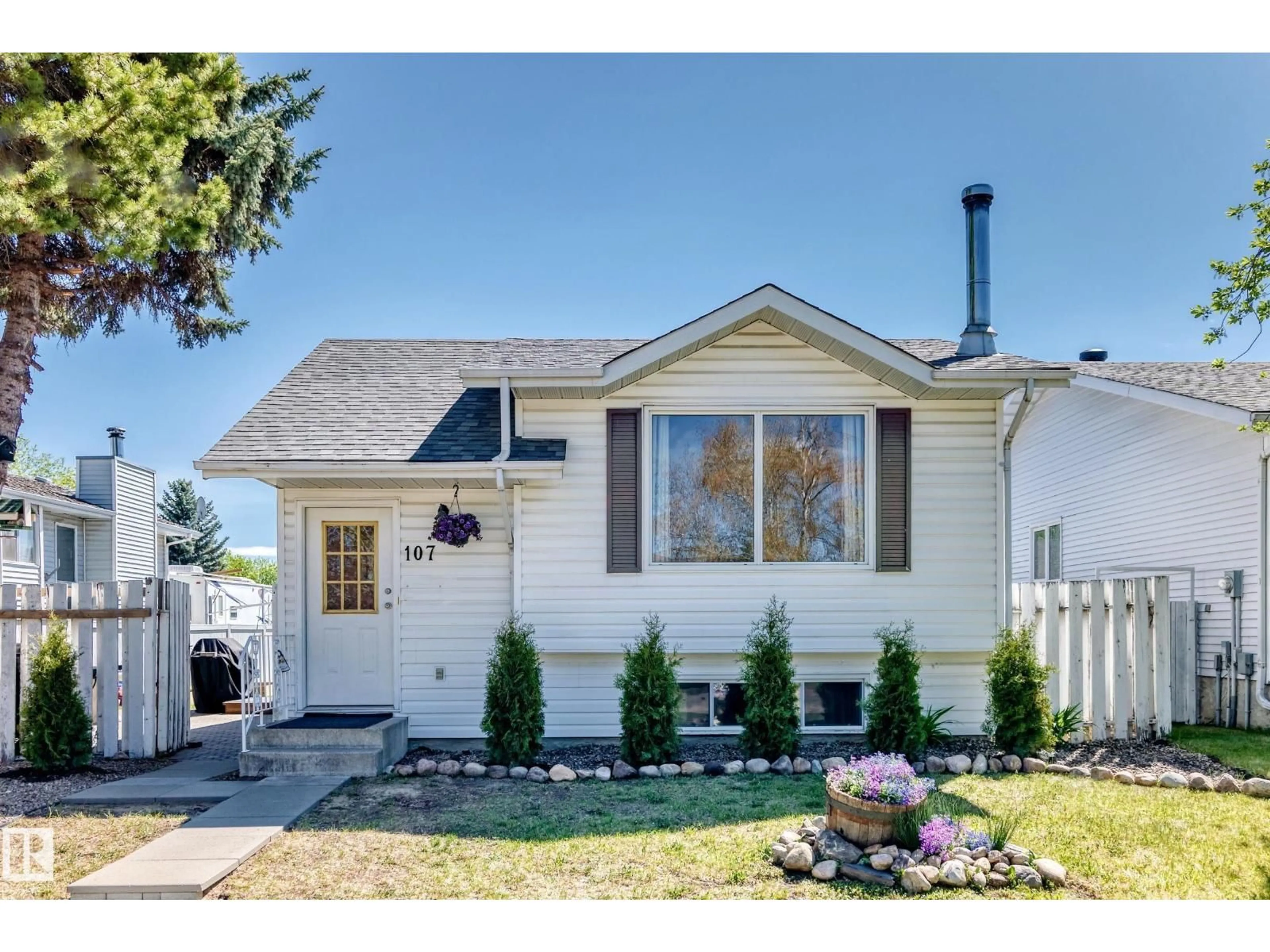 Home with vinyl exterior material, street for 107 MILLGROVE DR, Spruce Grove Alberta T7X2S4