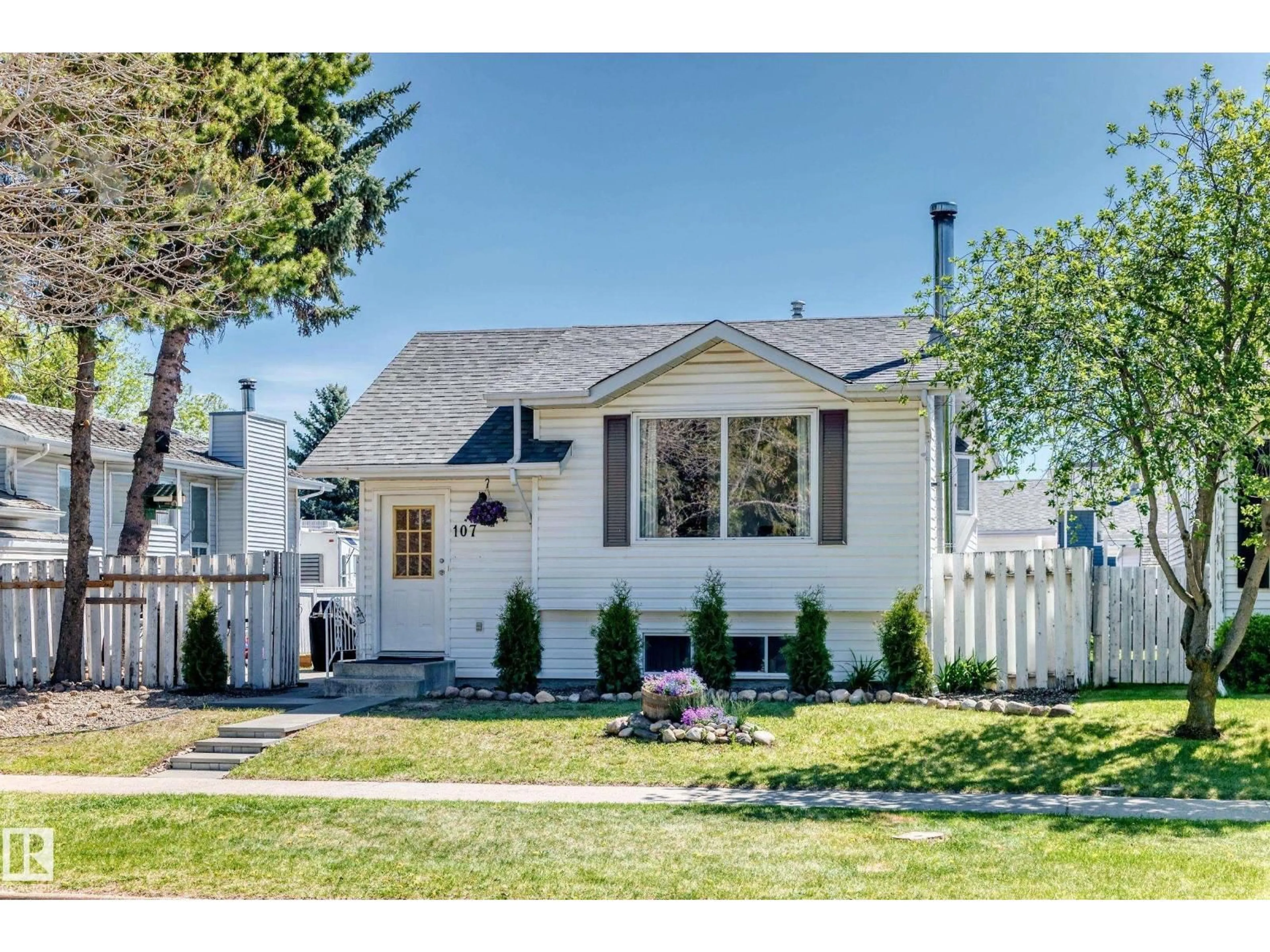 Home with vinyl exterior material, street for 107 MILLGROVE DR, Spruce Grove Alberta T7X2S4