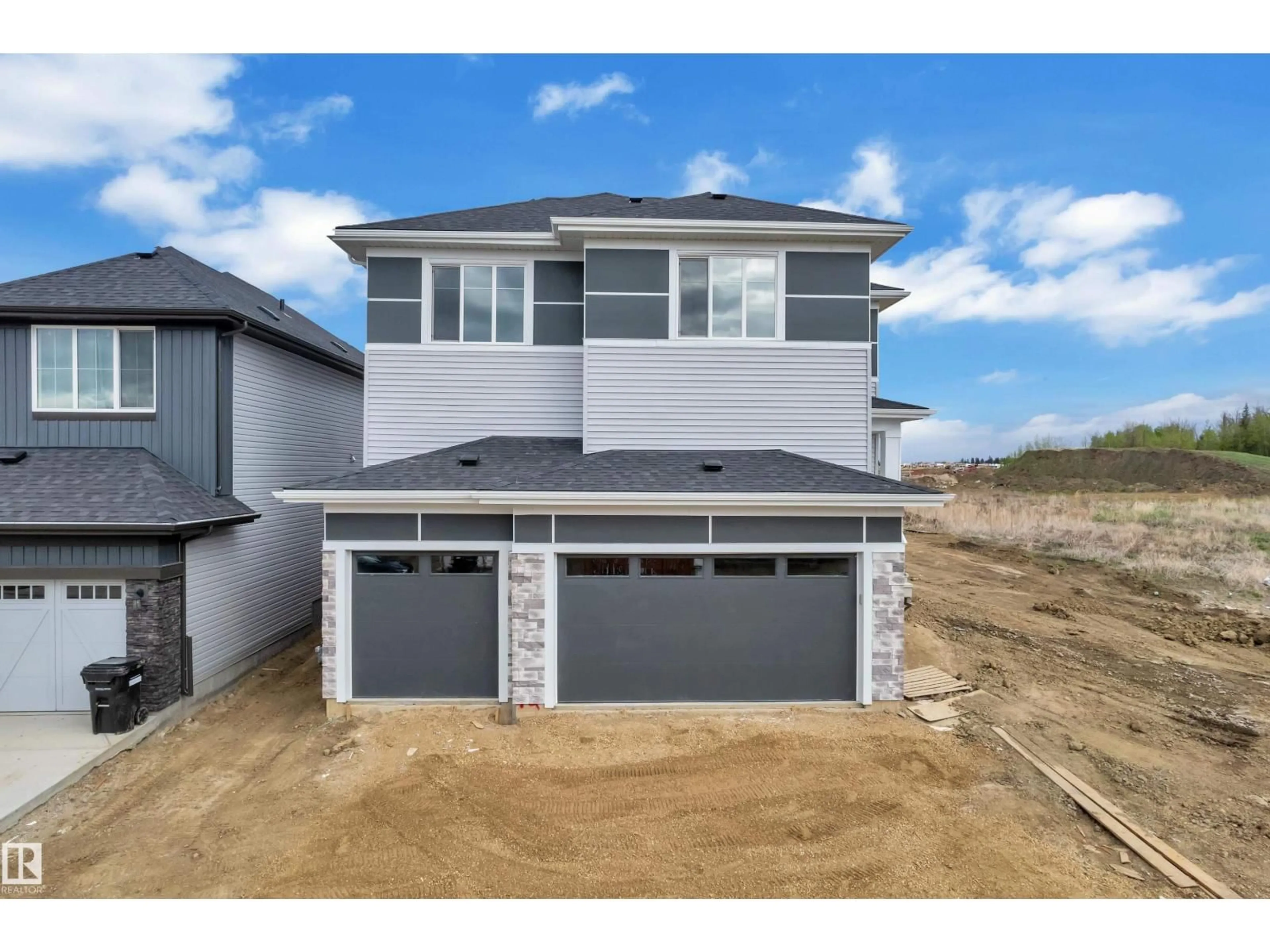 Home with vinyl exterior material, street for 12 COBBLESTONE GA, Spruce Grove Alberta T7X4E4