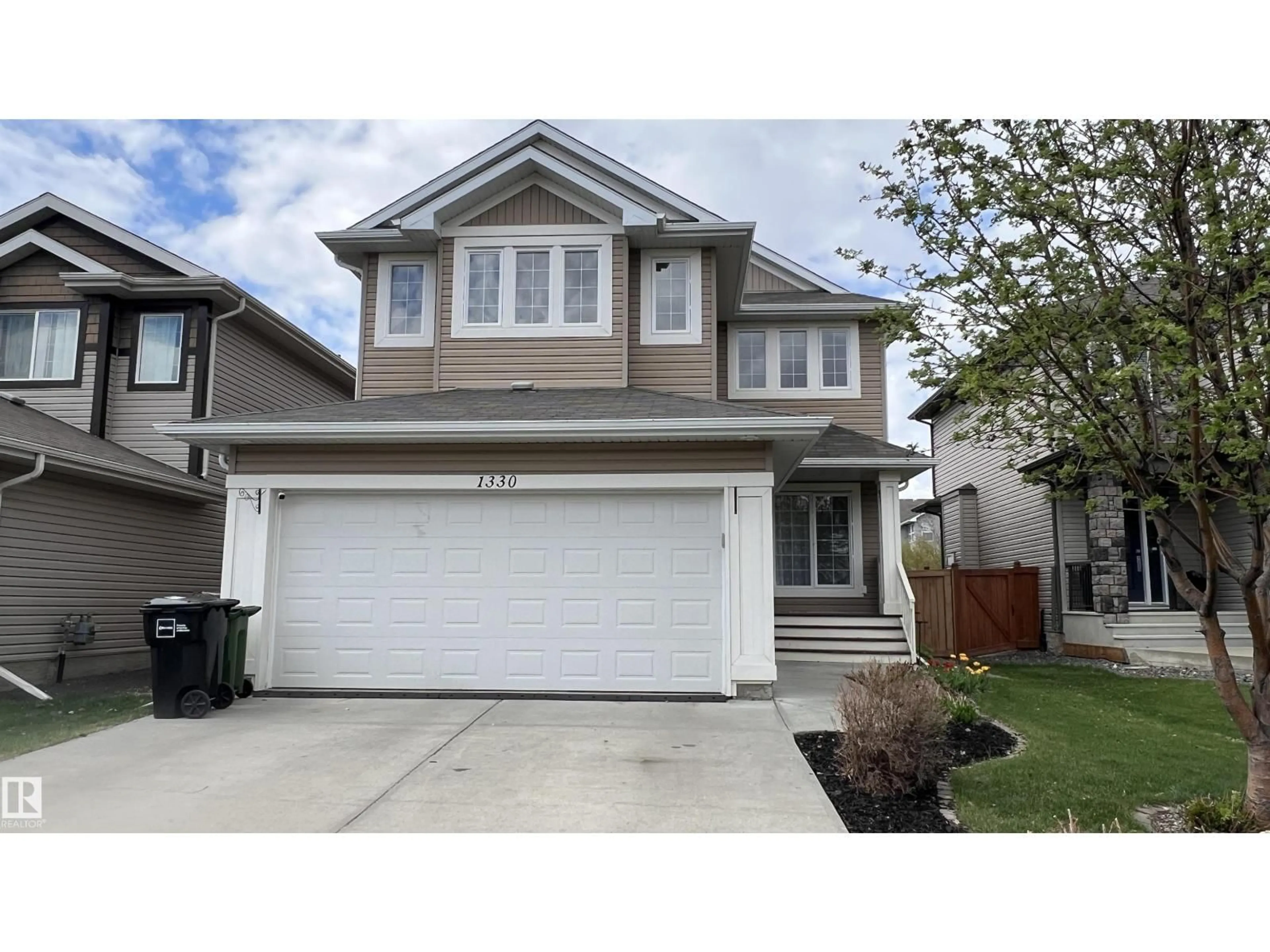 Home with vinyl exterior material, street for SW - 1330 114B ST, Edmonton Alberta T6W0G7
