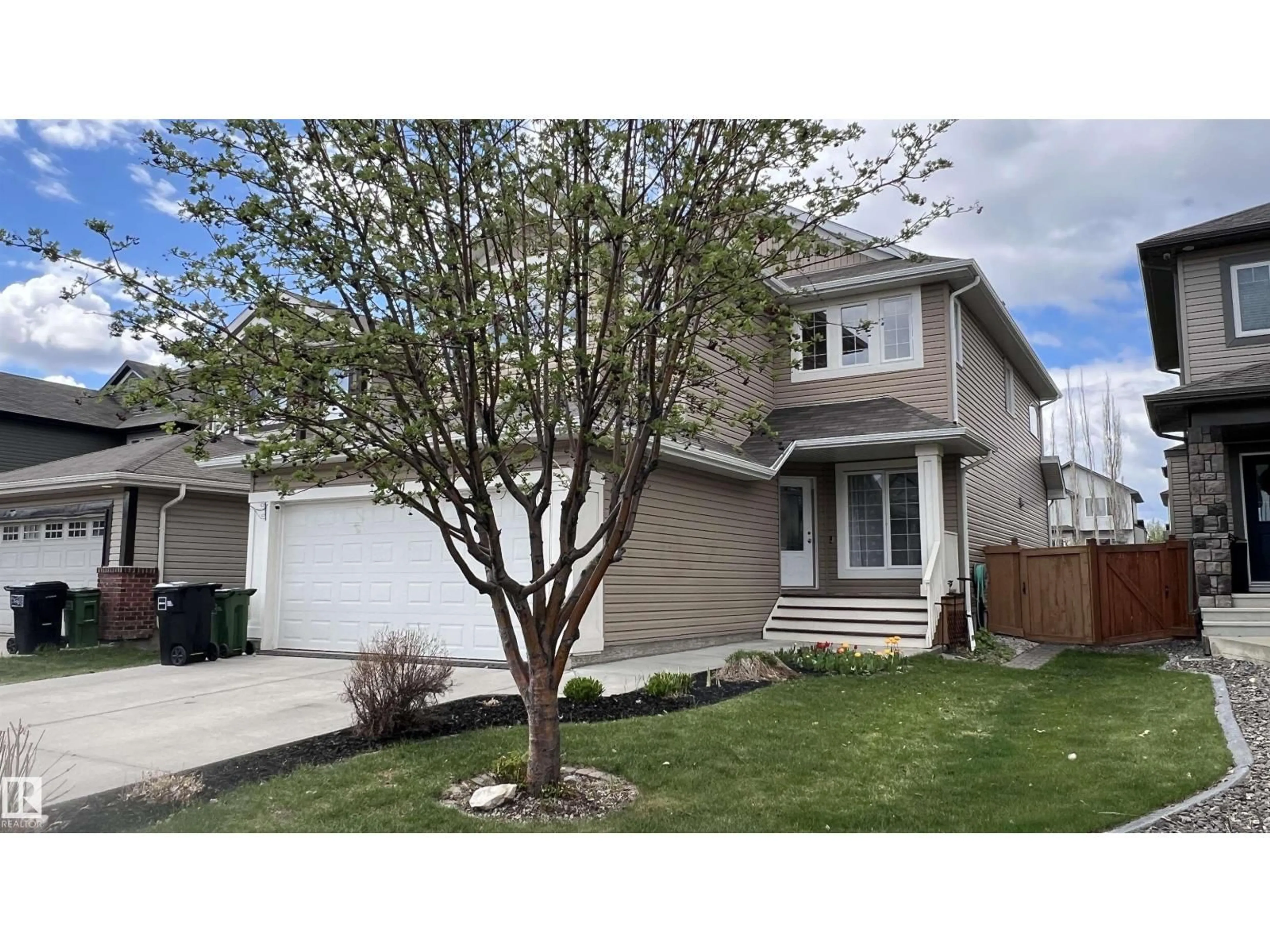 Home with vinyl exterior material, street for SW - 1330 114B ST, Edmonton Alberta T6W0G7