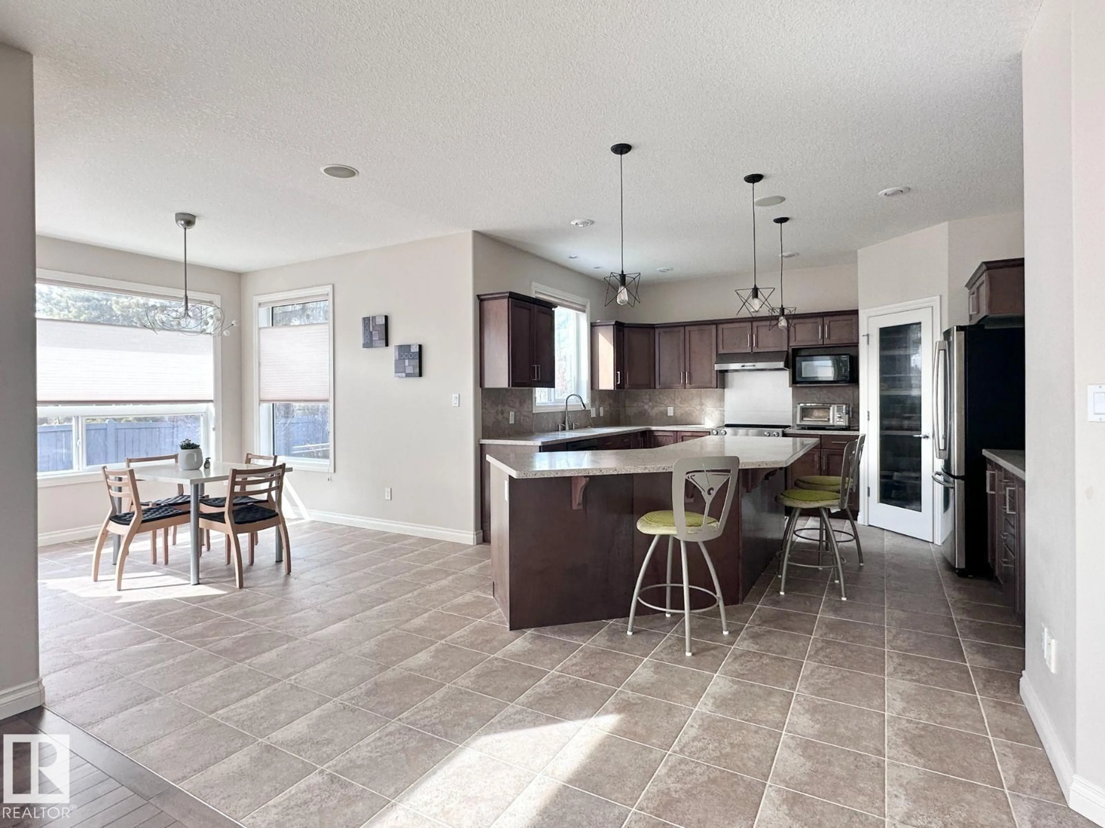 Open concept kitchen, ceramic/tile floor for 820 DRYSDALE RU, Edmonton Alberta T6M2Y4