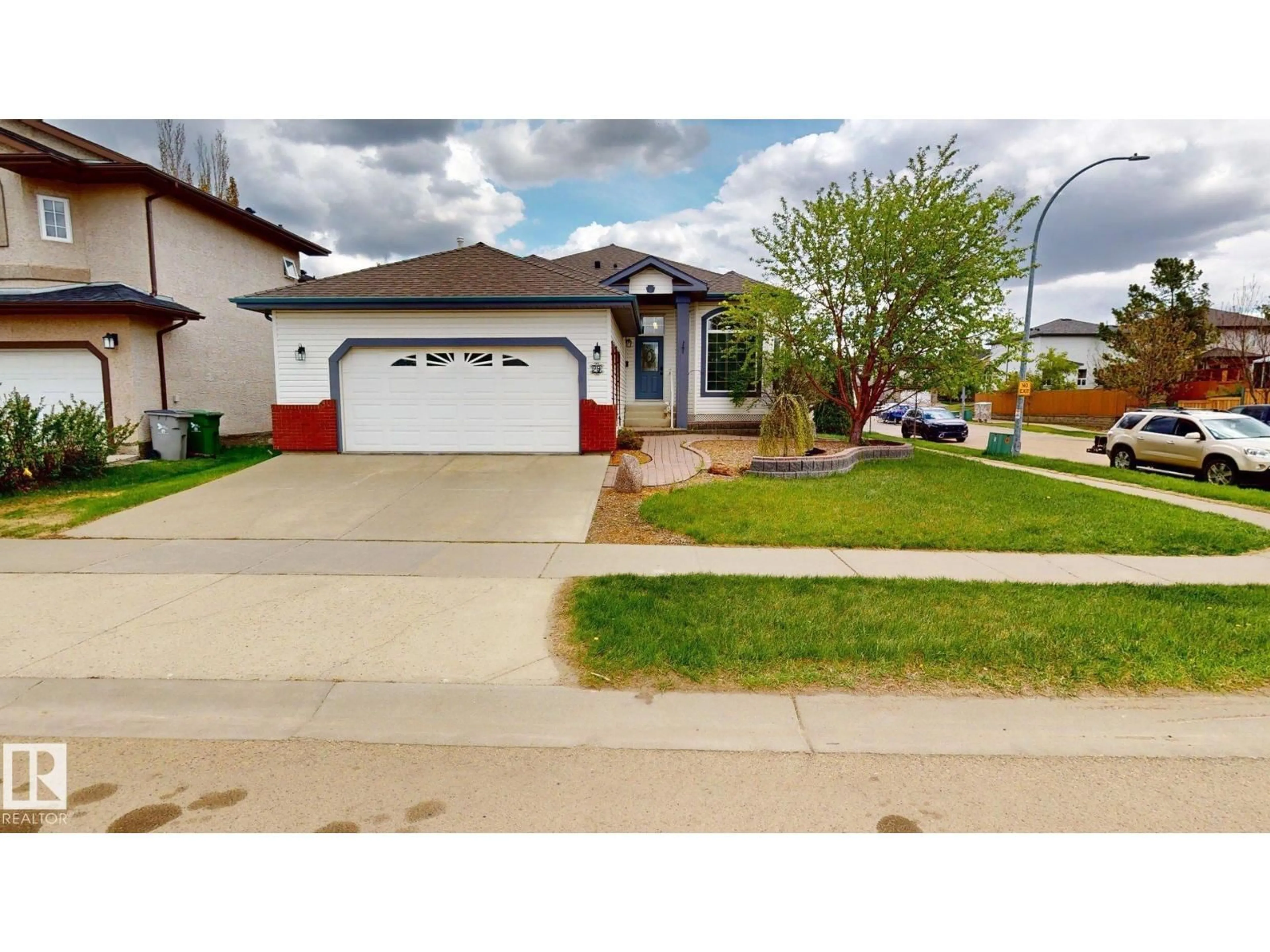 Home with vinyl exterior material, street for 29 RUE BOUCHARD, Beaumont Alberta T4X1R5