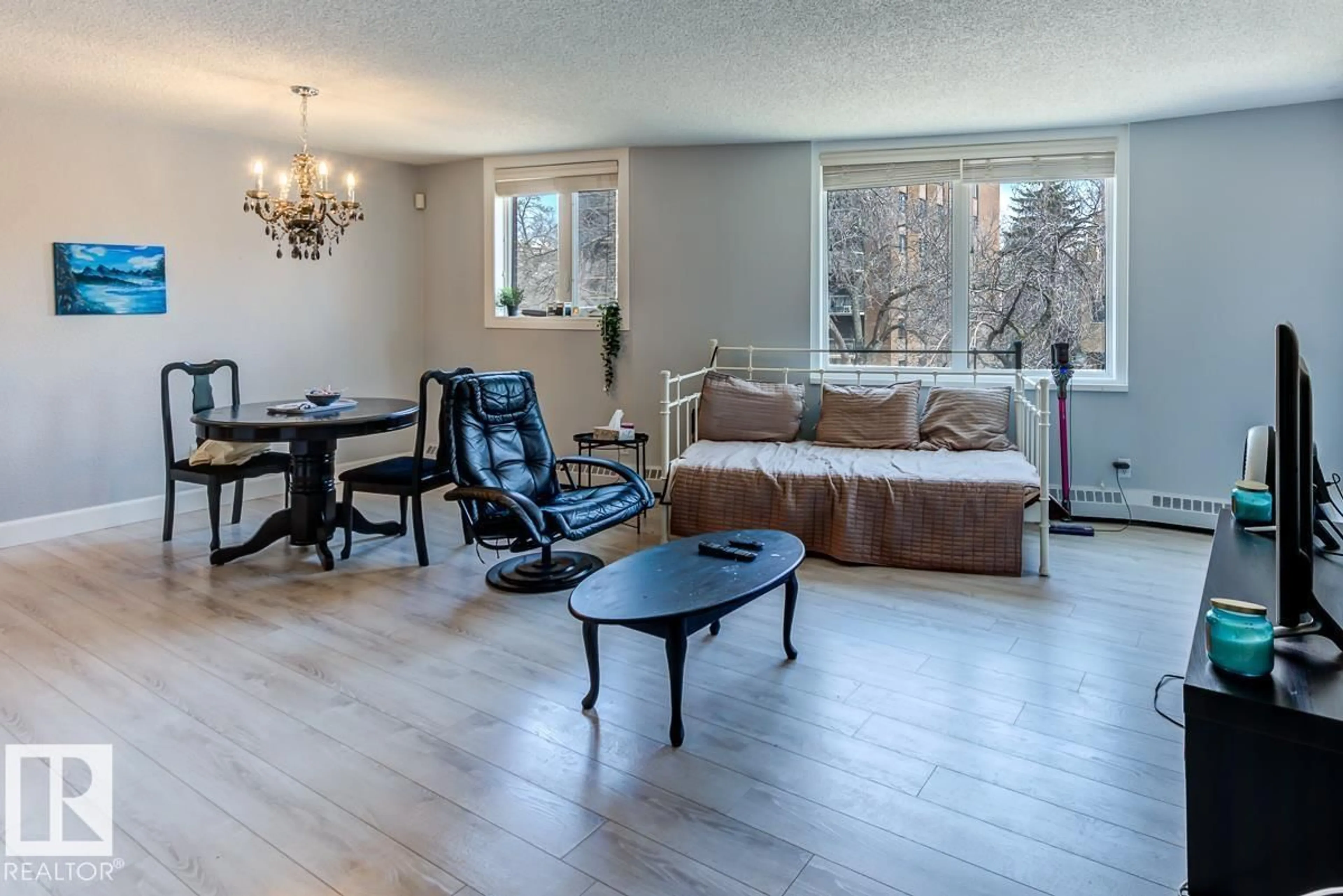 Living room with furniture, wood/laminate floor for #302 - 9916 113 ST, Edmonton Alberta T5K2N3