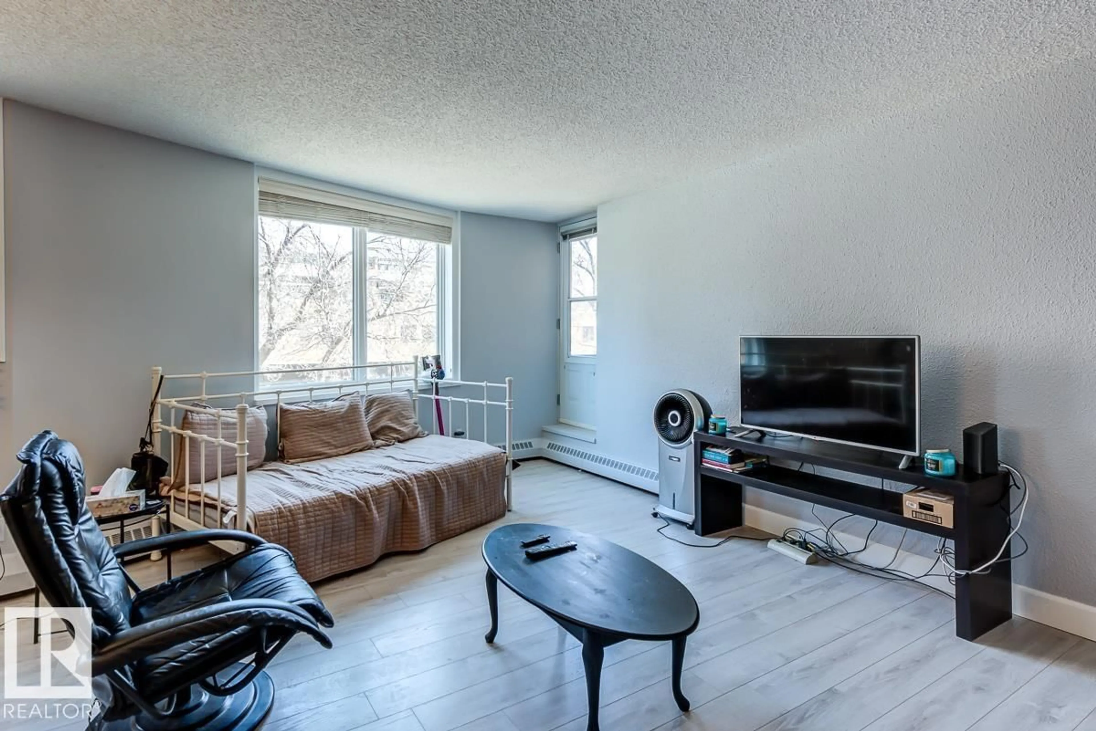 Living room with furniture, wood/laminate floor for #302 - 9916 113 ST, Edmonton Alberta T5K2N3