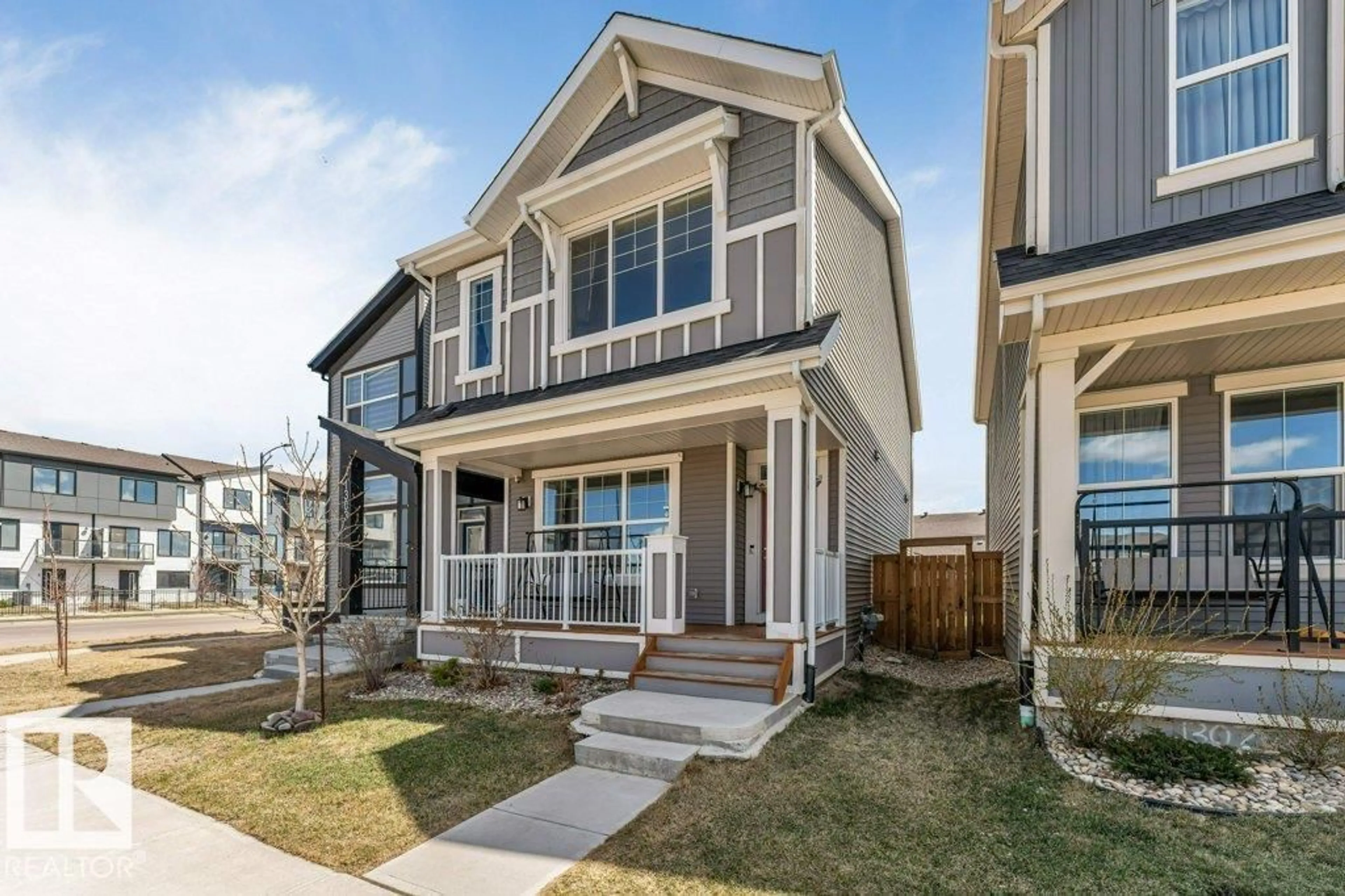 Home with vinyl exterior material, street for SW - 1305 DARBY WY, Edmonton Alberta T6W4N3