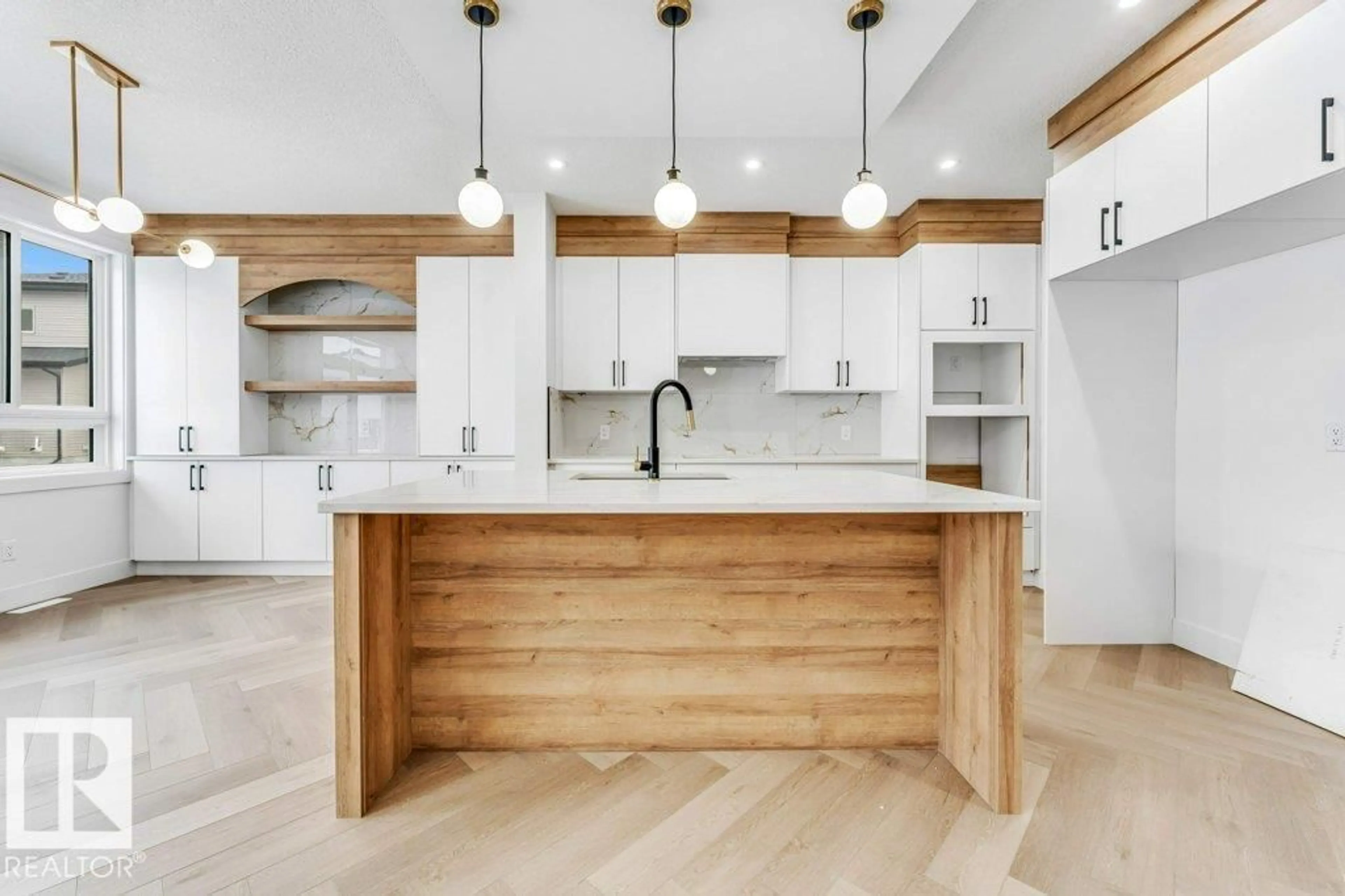 Open concept kitchen, wood/laminate floor for 1824 62 AV, Rural Leduc County Alberta T4X3C8