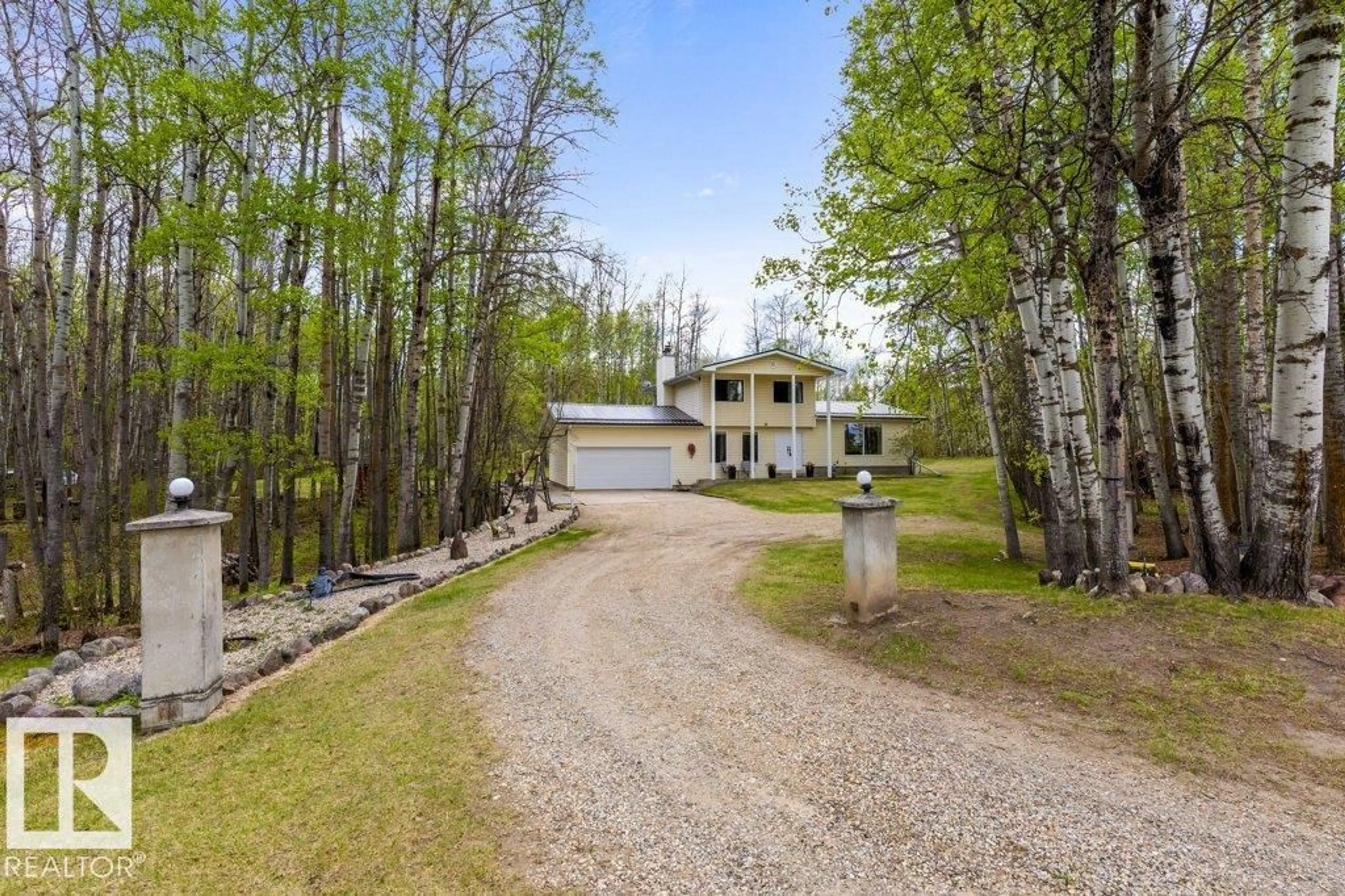 A pic from outside/outdoor area/front of a property/back of a property/a pic from drone, unknown for 138 27507 TWP ROAD 544, Rural Sturgeon County Alberta T8R2B5