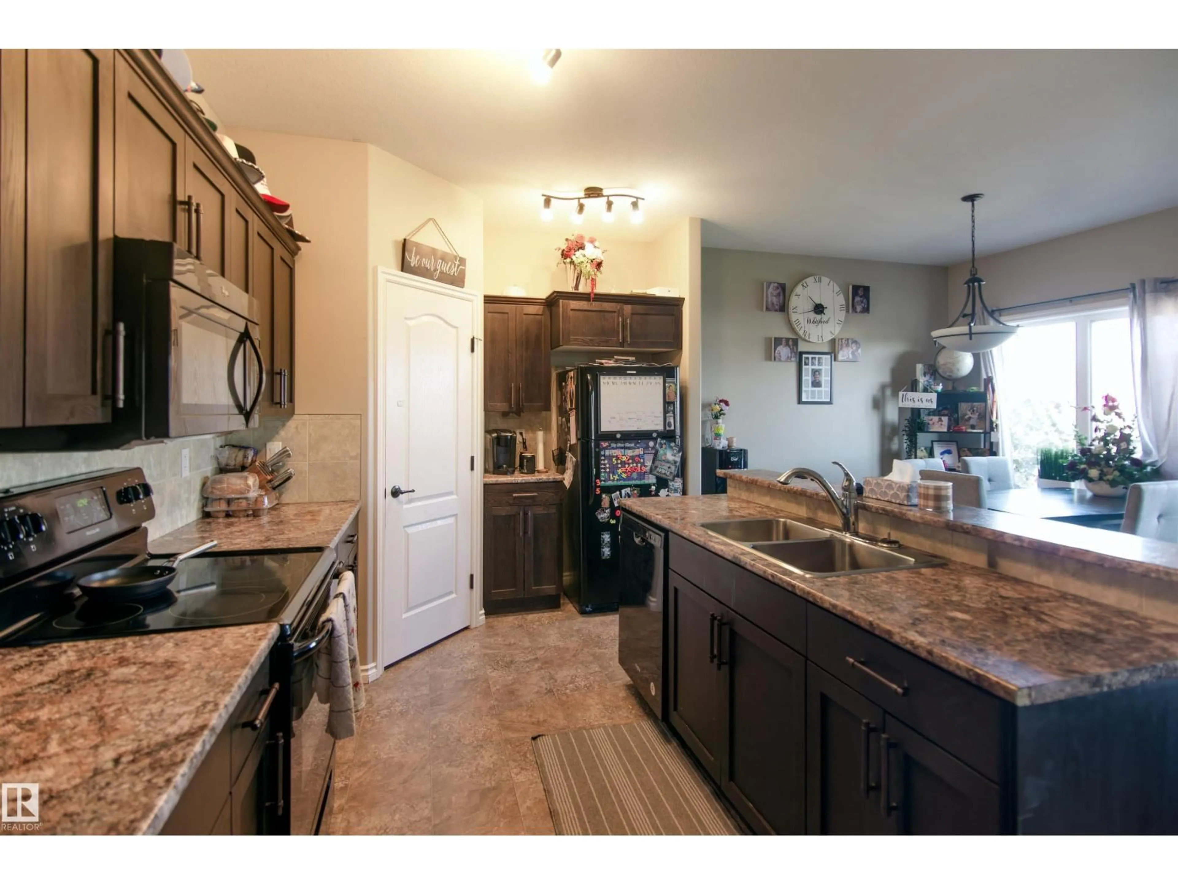 Open concept kitchen, ceramic/tile floor for 3731 44 AV, Bonnyville Town Alberta T9N0A9
